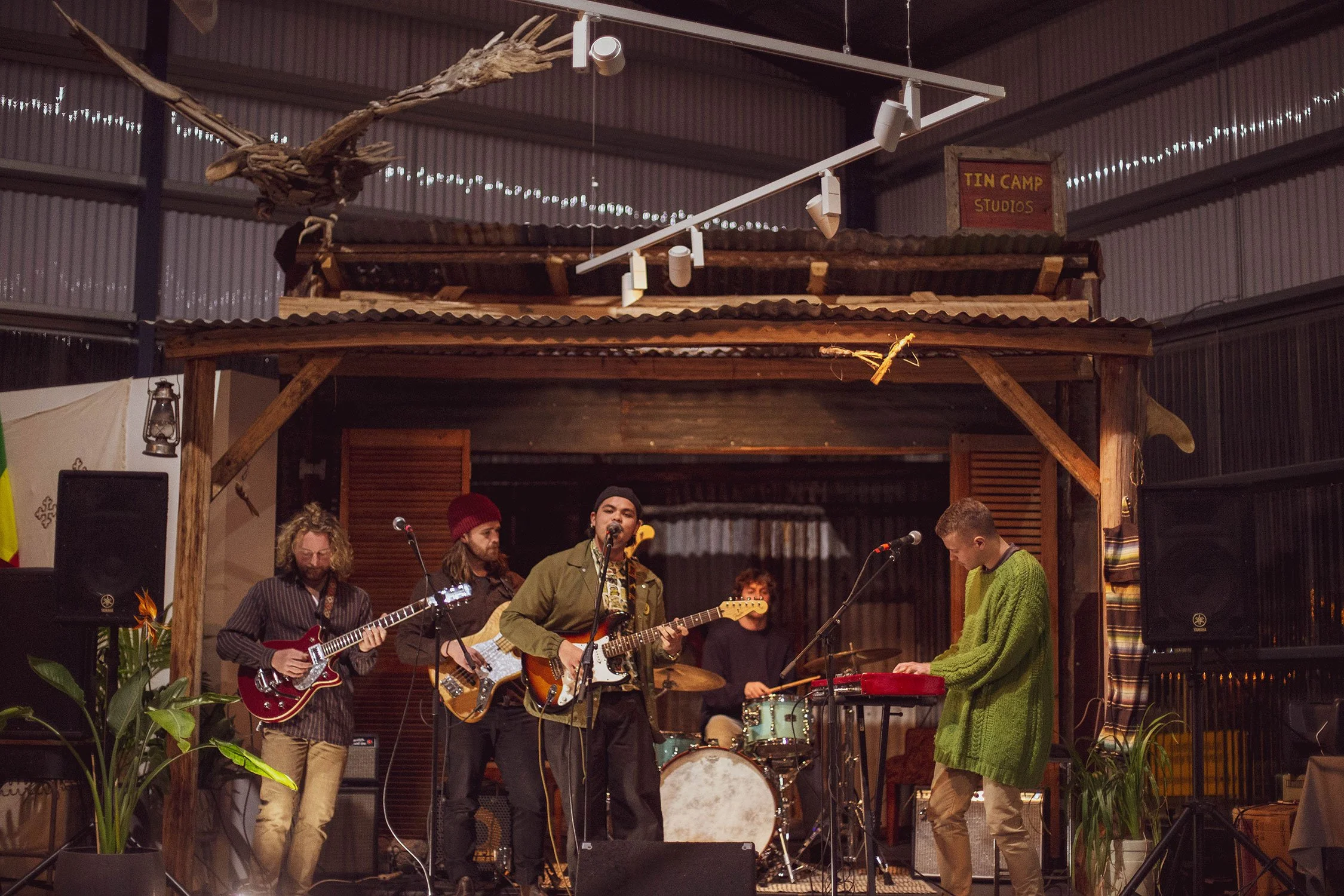 Indigenous man and his band performing music