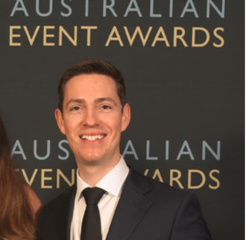 Person in formal attire at Australian Event Awards