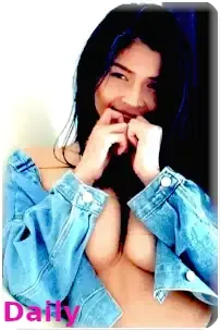 Pattaya outcall escort Daily poses for the camera in a white bra, exuding confidence and charm in a playful manner.