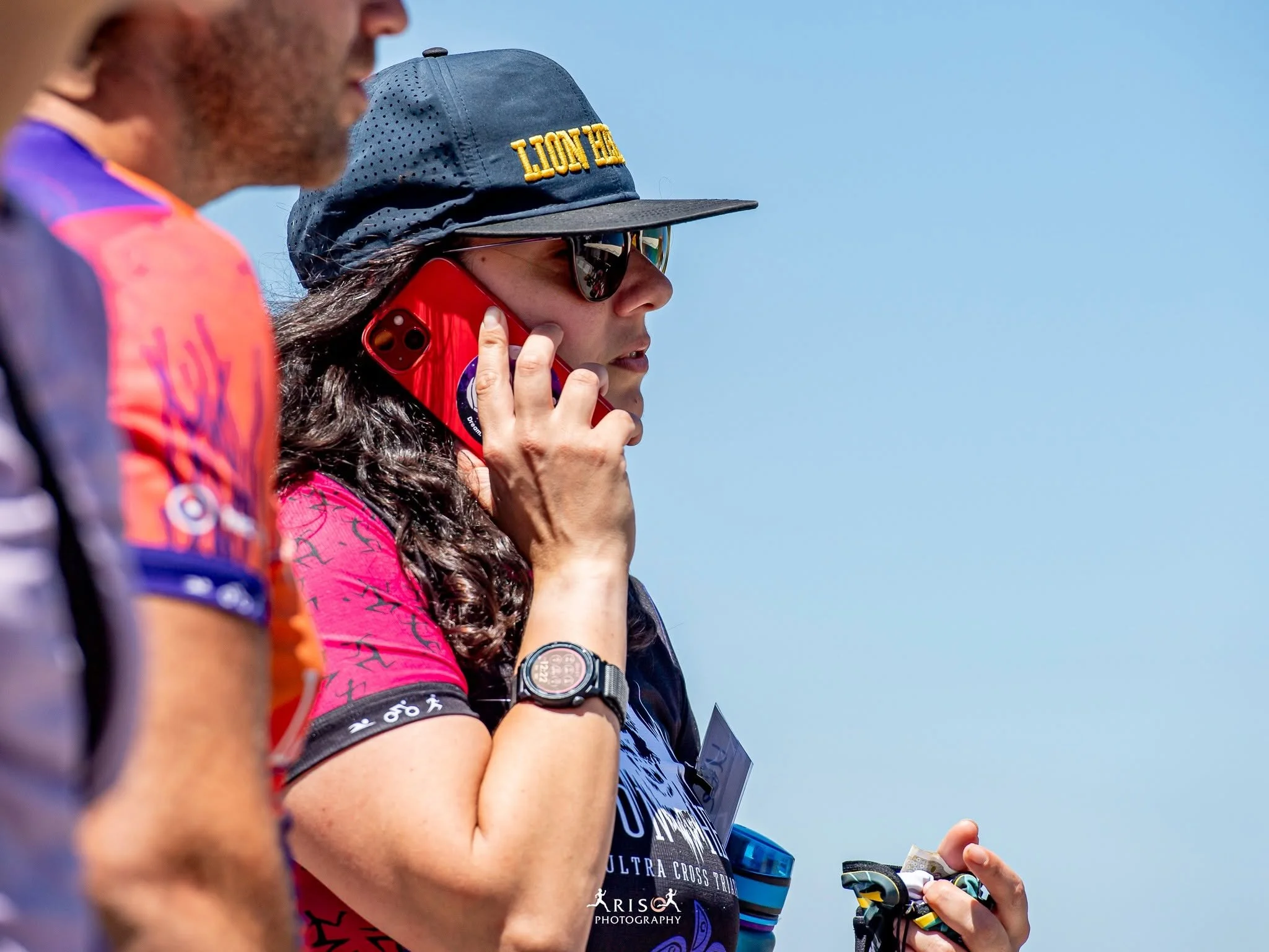 Ivena at Lion Heart (Лъвско сърце) speaking on the phone, helping with the organization of the race on site
