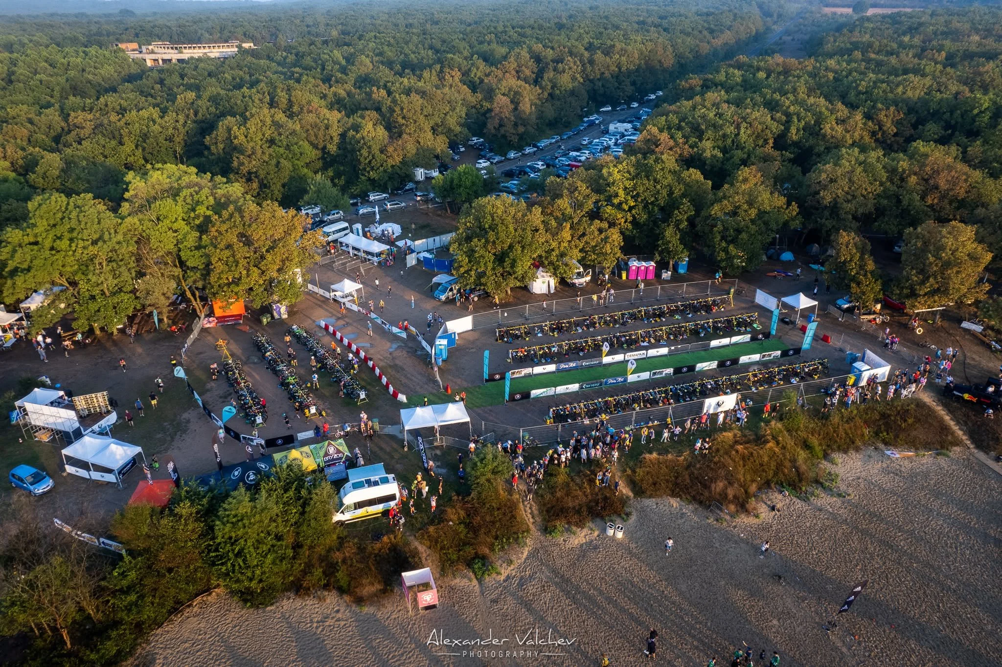 Lion Heart (Лъвско сърце) base camp in Primorsko 2024, featuring bike racks, tents, transition zones and fan sections