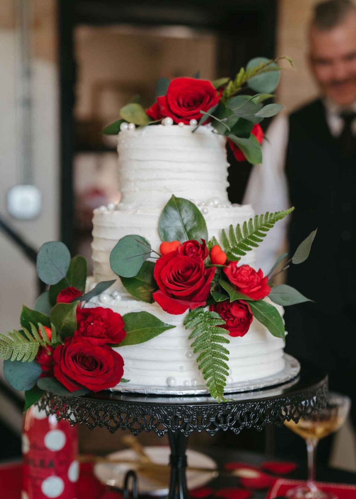 The Historic Dallas Jail Real Wedding Shayne and Katie 3 Tiered Wedding cake with roses.jpg