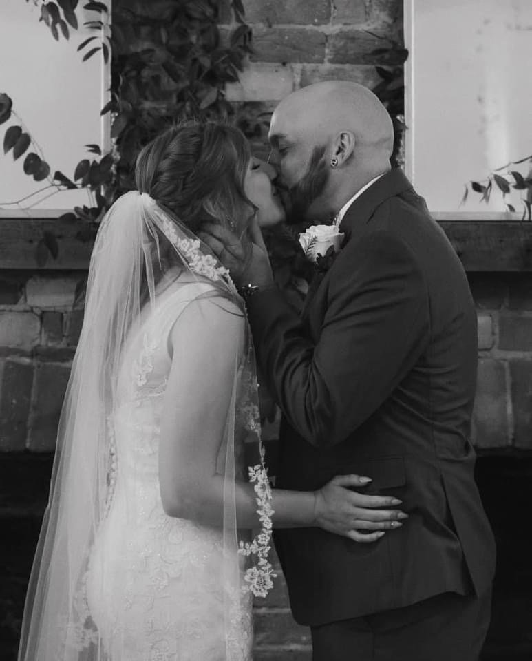 The Historic Dallas Jail Real Wedding Fall Black and White First Kiss.JPG