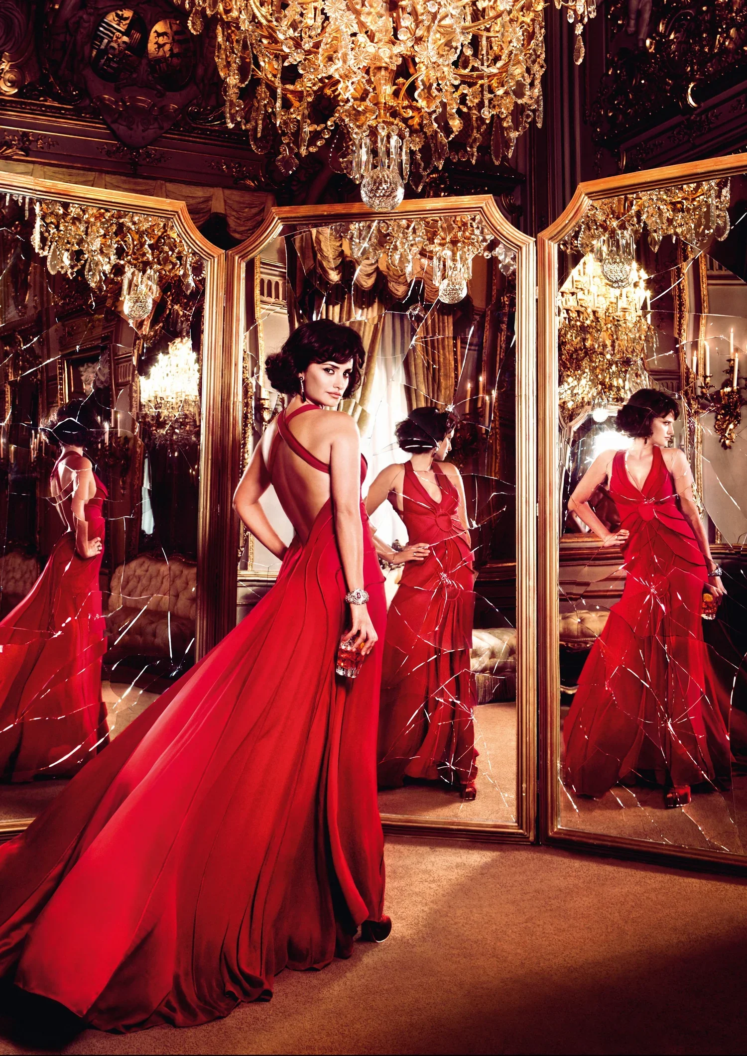 Woman in a red evening gown in a mirrored room, from a Campari calendar campaign art directed by Andrea Marzagalli
