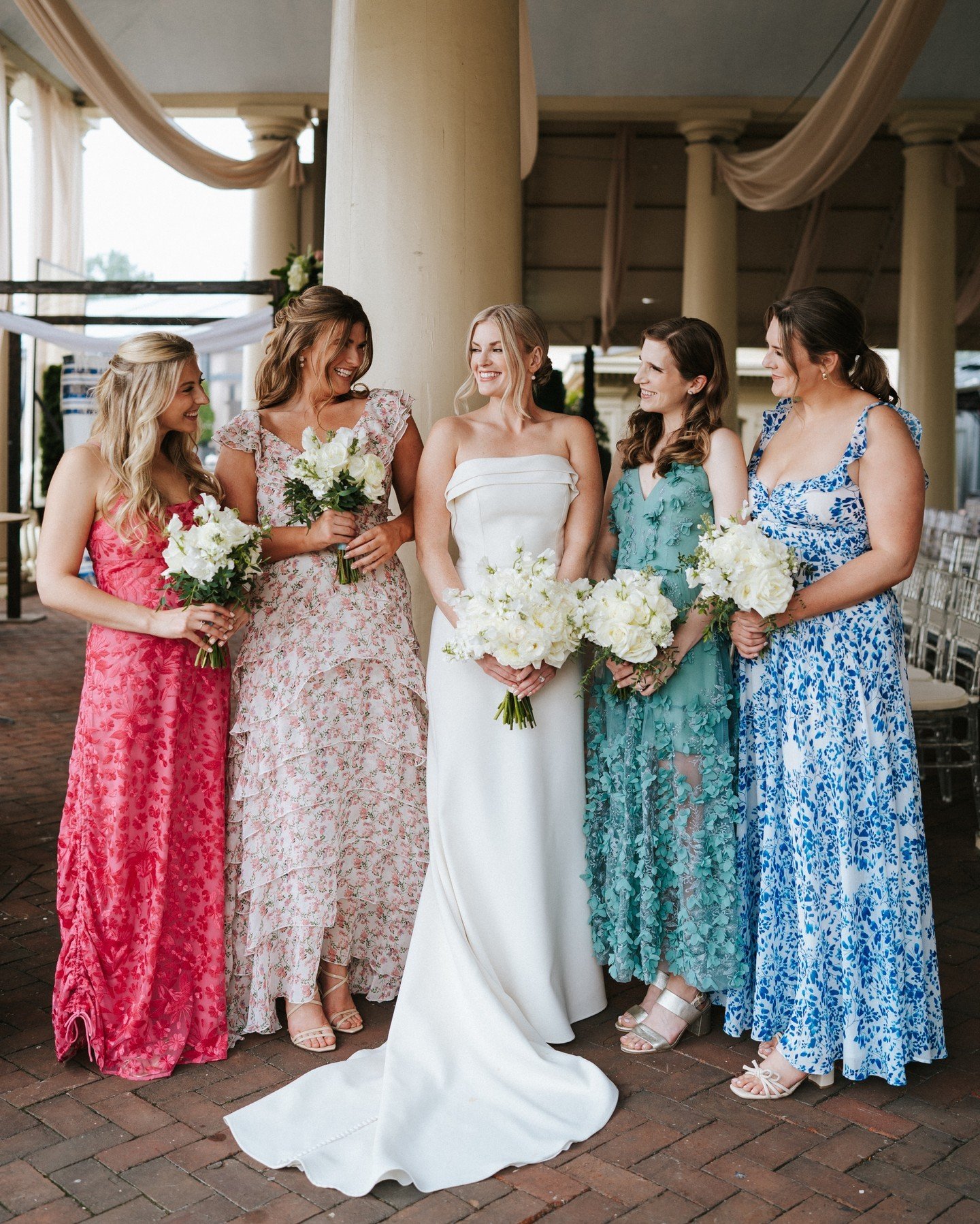 Spring blooms aren't the only vibrant hues today&mdash;we've got a rainbow of colorful dresses and a bridal party that slays 🌈💍🤍

📸 @rachelrosensteinphoto