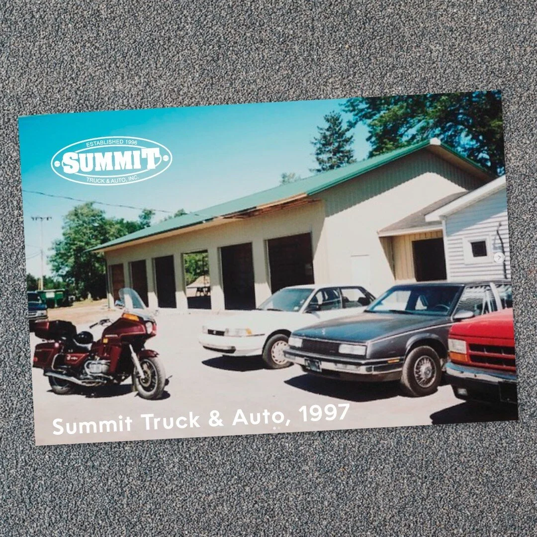 Did you know Summit is 26 years old? 🥳

Cliff opened Summit in 1996 with 3 cars in the undeveloped lot of an abandoned restaurant building.

 Shortly after, the garage went up (shown in picture) &amp; the business continued to grow in to what Summit