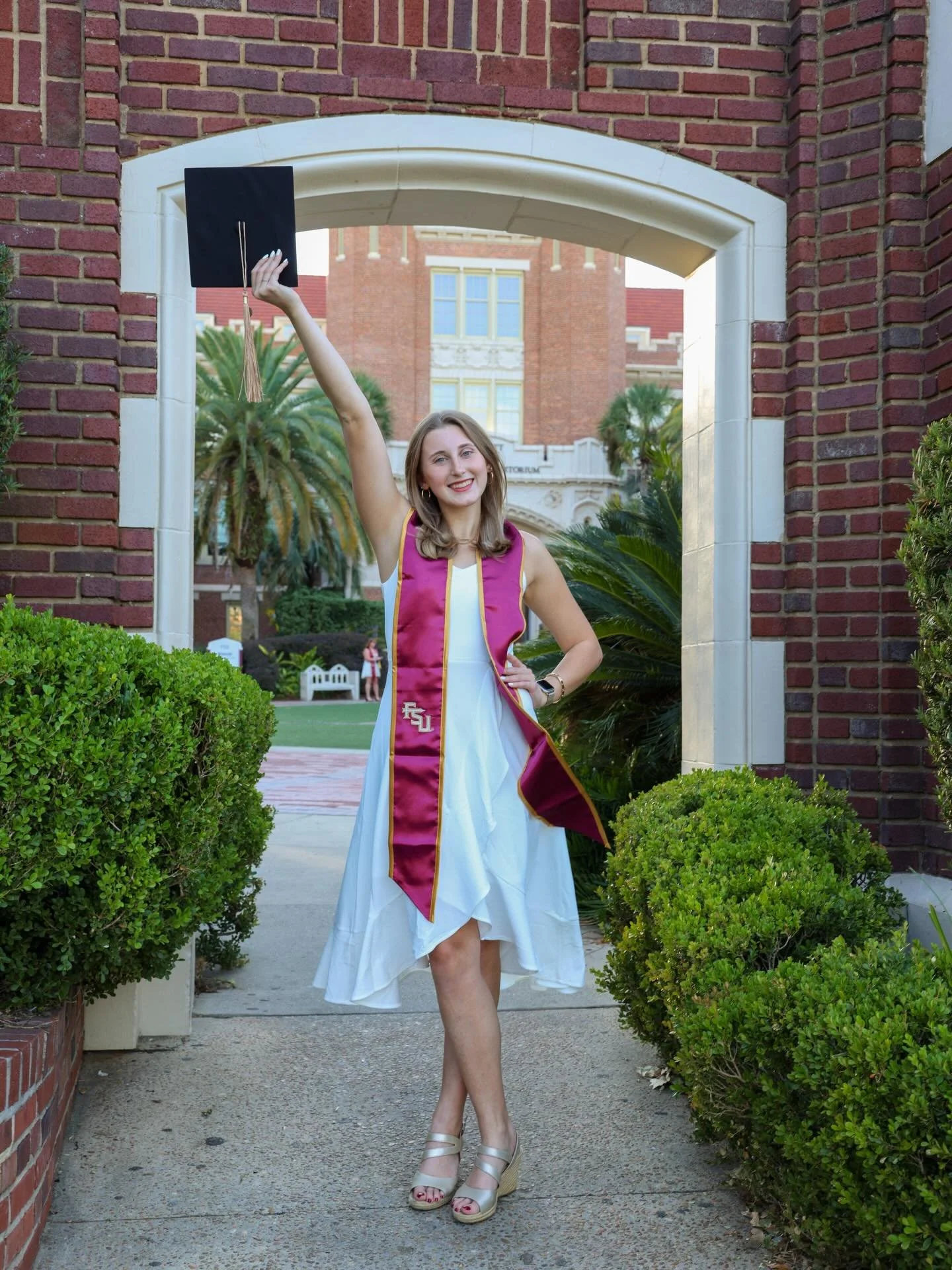 You earned this. Graduation photos that feel natural, confident, and true to you. Spring 2026 bookings are open.