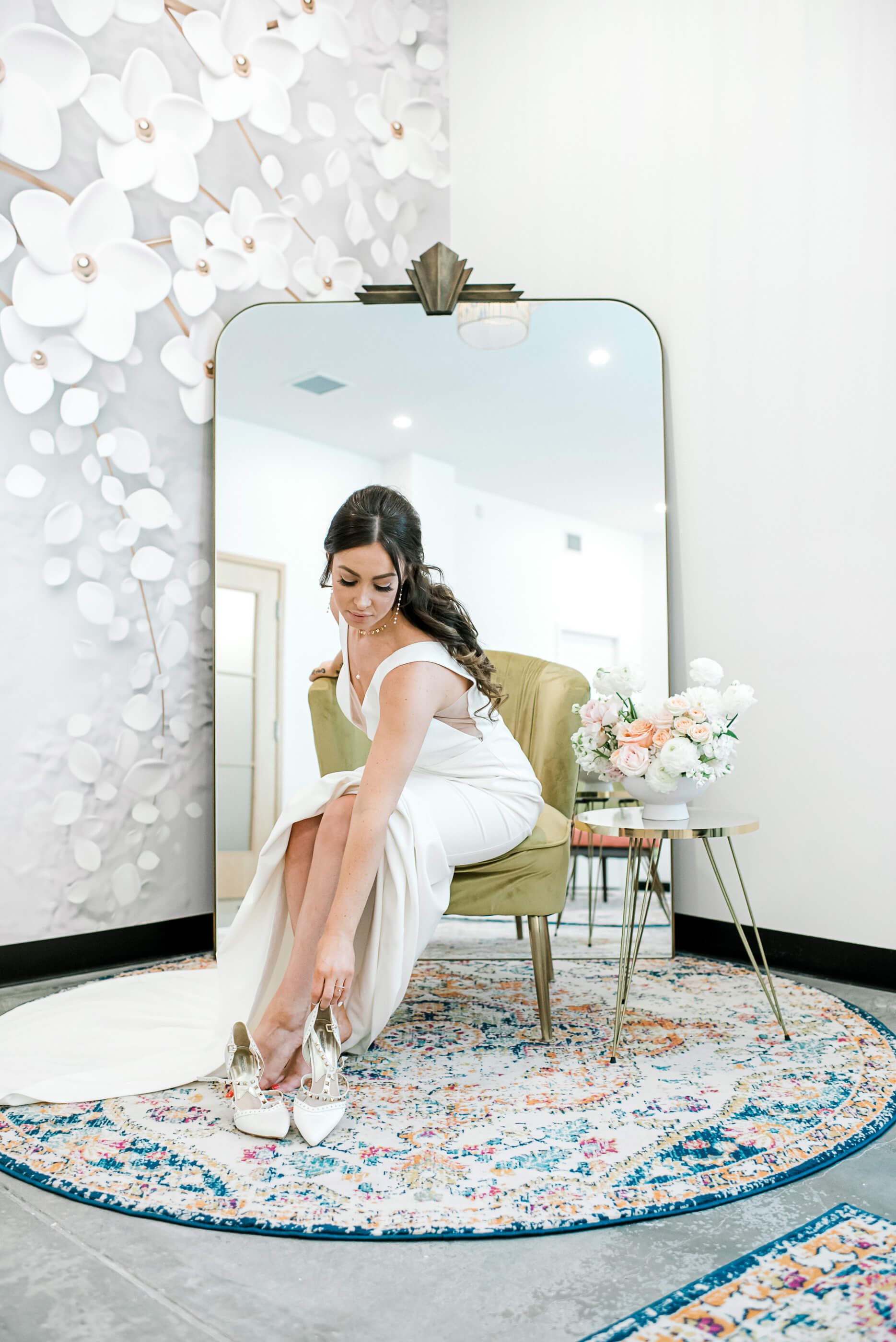 Bride-sitting-in0front-of-mirror.jpg