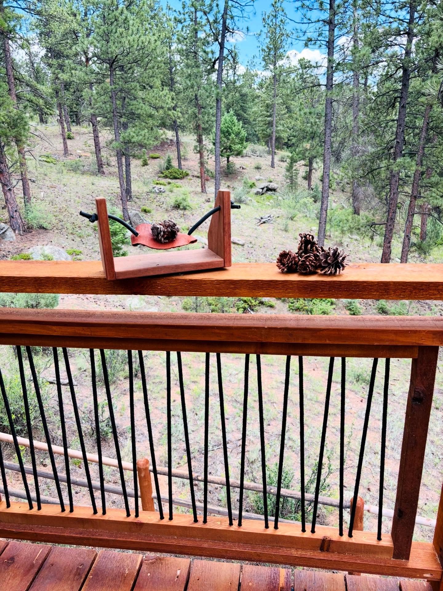 Pinecone launchers!  We custom make these slingshots, and the Buffalo Creek Treehouse got TWO of them!  Good idea for kids&hellip;or great idea?