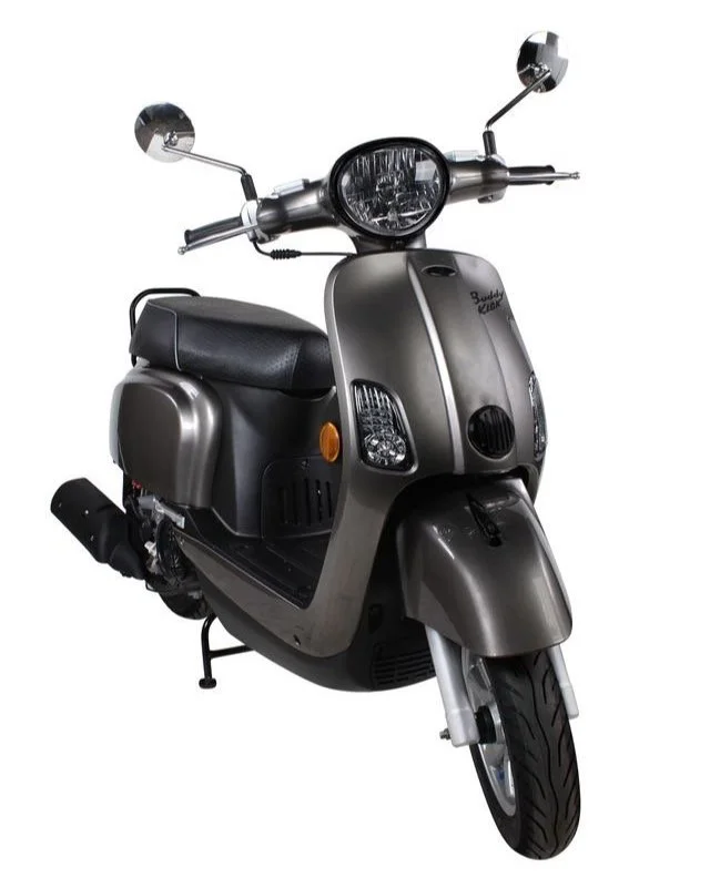 Gray Buddy Kick electric scooter with black seat, mirrors, and front headlight