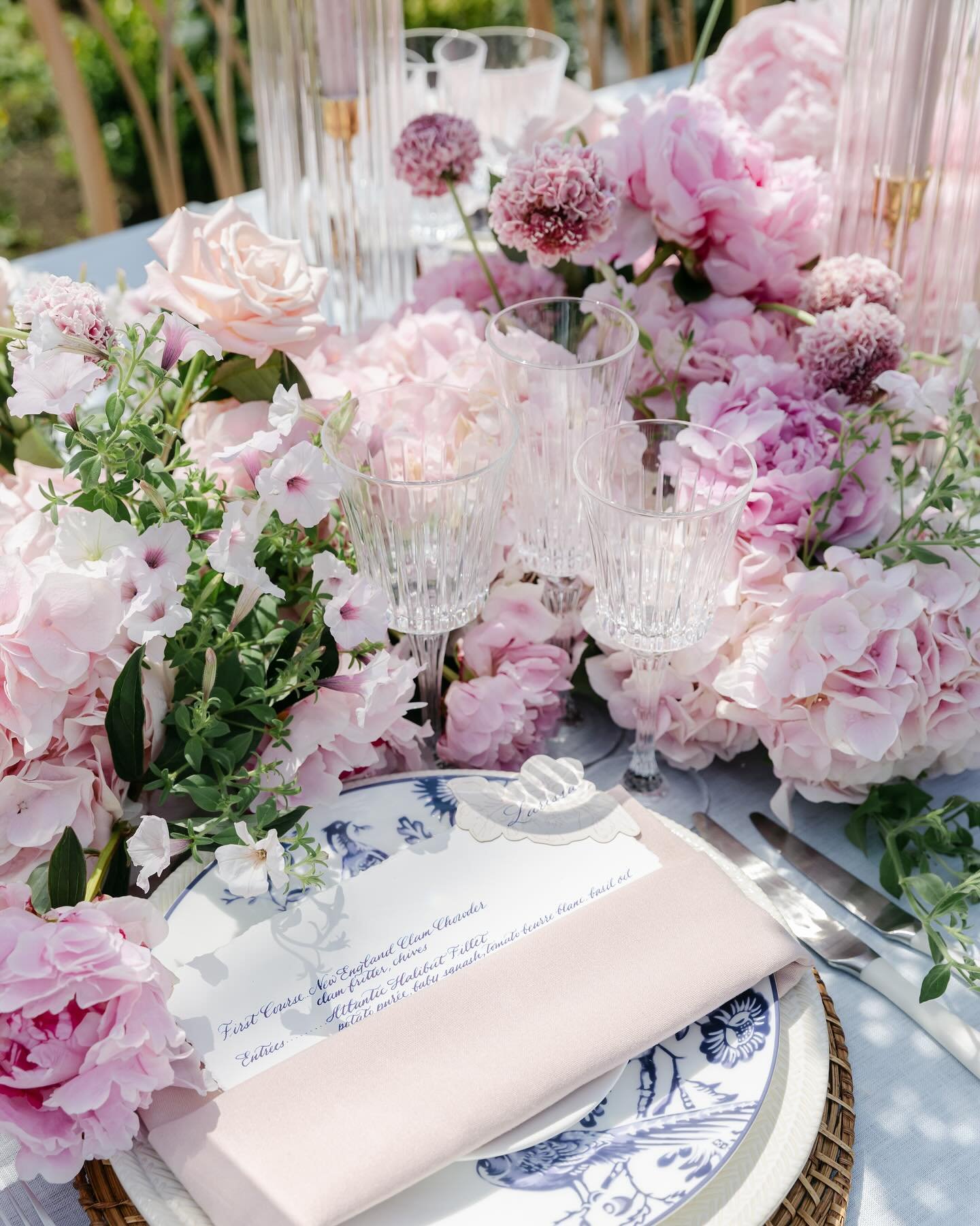 Colorful details and beautiful chandeliers 💜 @liabancroftevents put together beautifully, photographed by @evaalexandraphoto and gorgeous flowers from @keriannenelsonflora 

#christinadesignstudio #cdsinvitations #customweddinginvitations #custominv