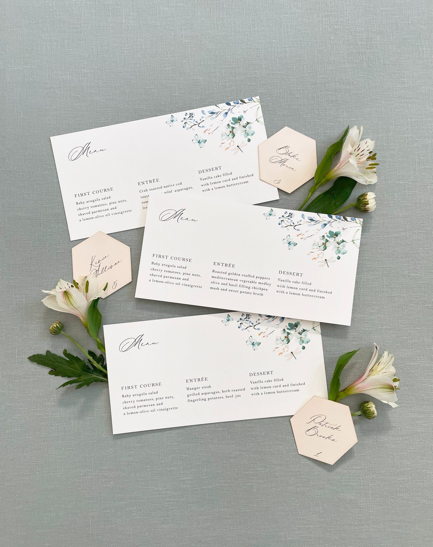 Personalized menu cards with laser cut escort cards 🌿

#christinadesignstudio #weddingplanningbegins #fineartinvitations #customweddinginvitations #stationerydesign #lasercutinvitations #weddinginvitationsuite #weddingtrends2024 #simpleweddinginvita