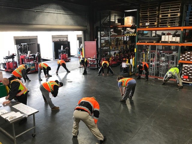 Exercise warmups in the in warehouse.jpg