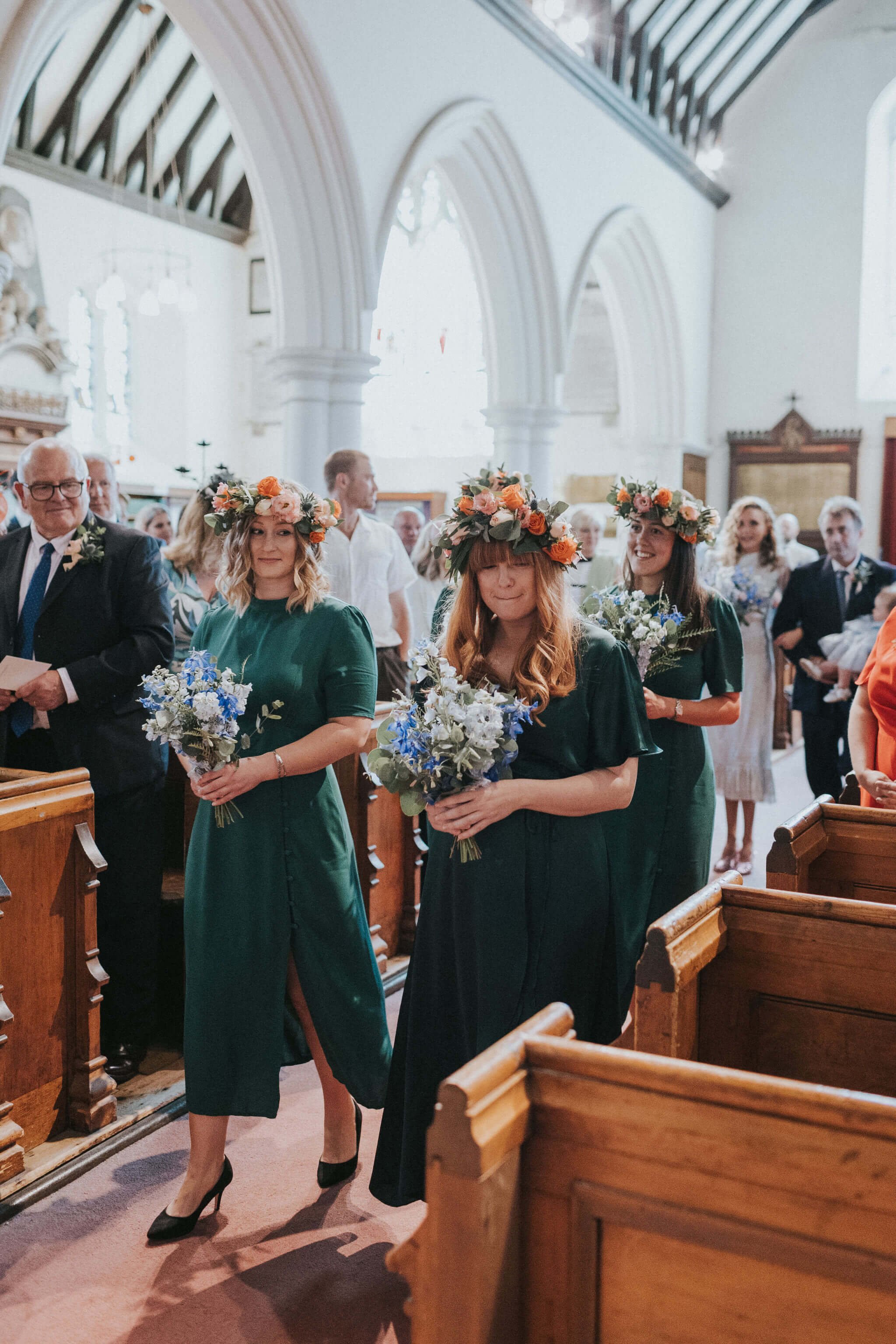 Bridesmaids-church-entrance-with-bouquets.jpg