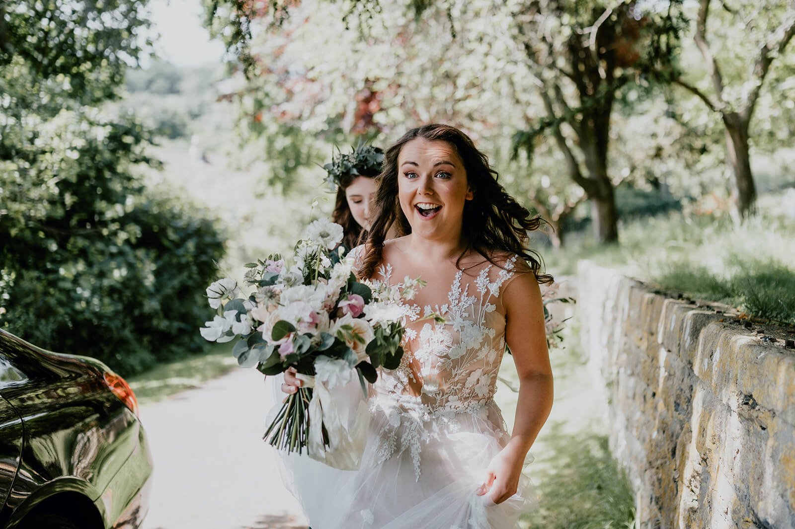 bride-smiling-with-bouquet.jpg