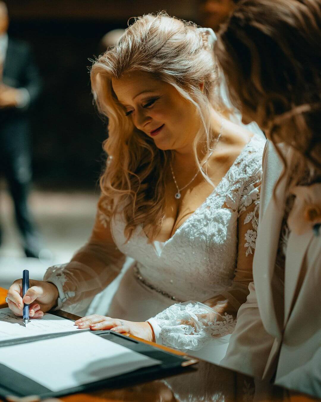 Brides-signing-wedding-certificate.jpg