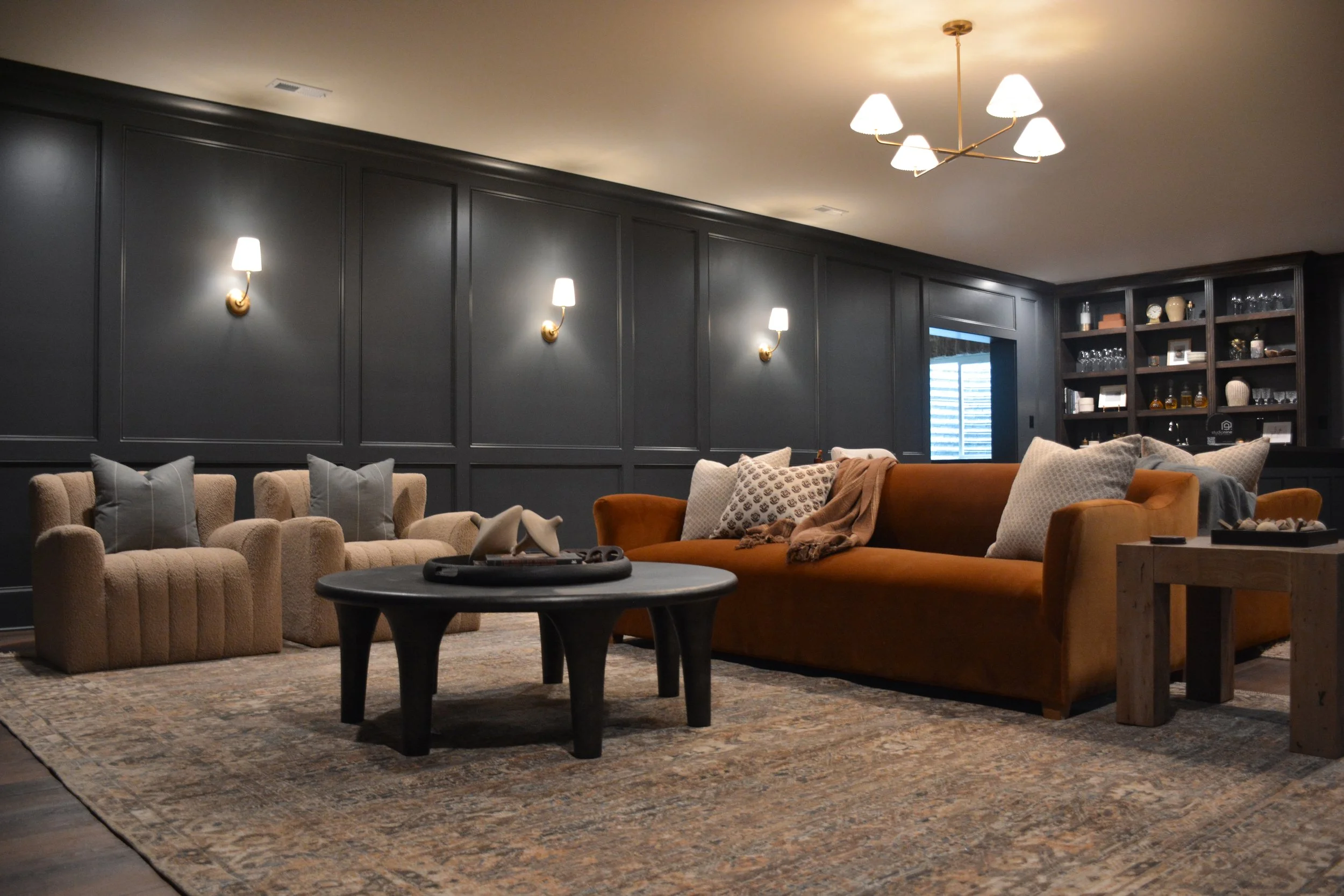 Moody Paneled Basement Living Room.jpg