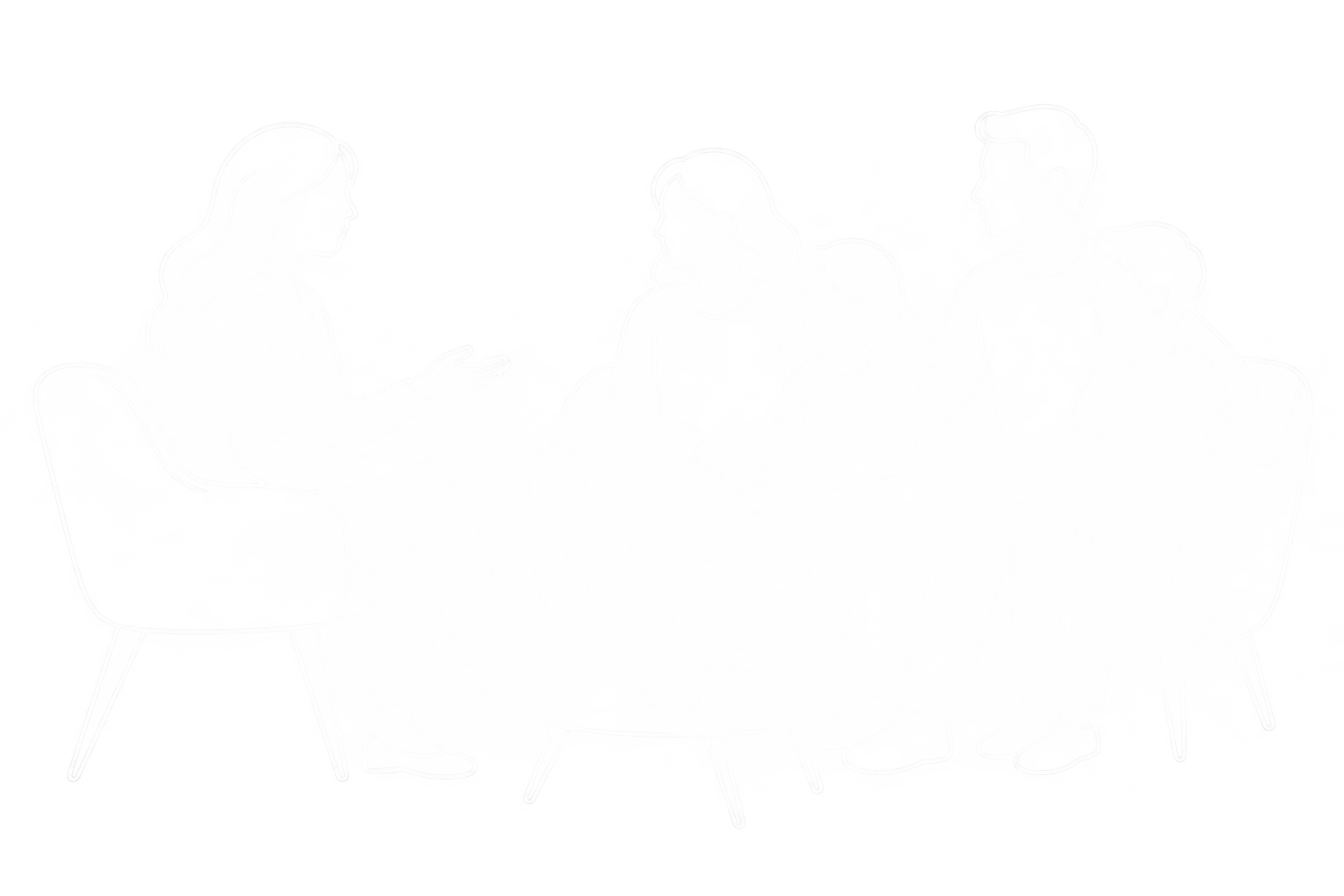 family sitting on couch with therapist