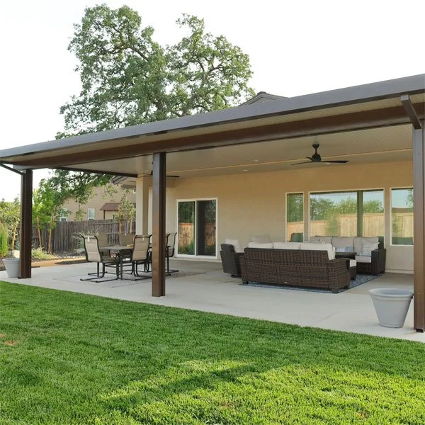The backyard of a home in Chico CA with shade from an aluminum patio cover