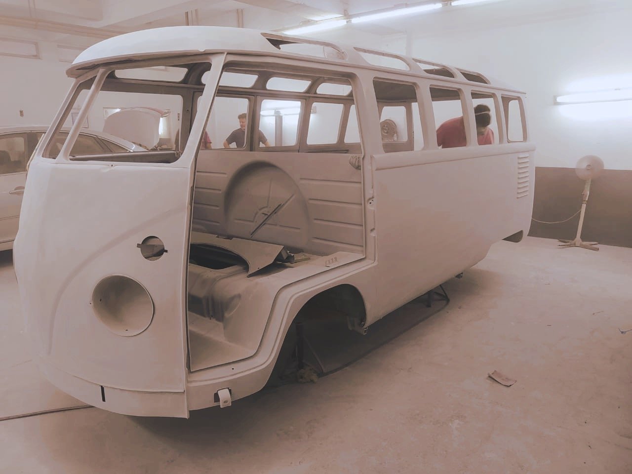 Unfinished vintage van in a workshop