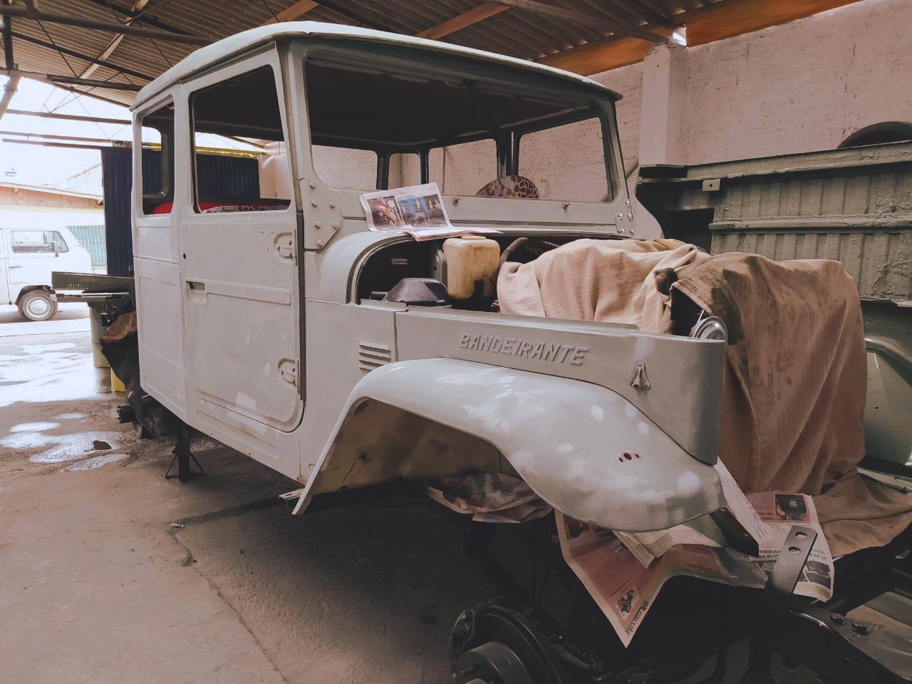 Partially restored Toyota Bandeirante in a garage