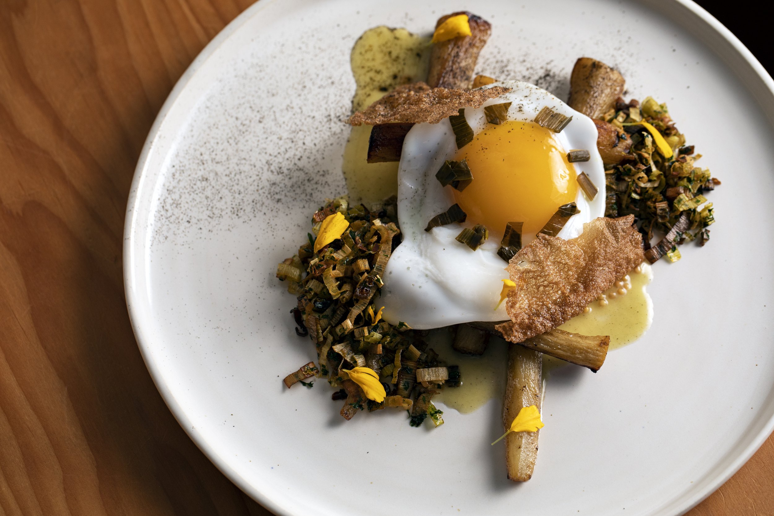 Pan roasted salsify topped with duck egg
