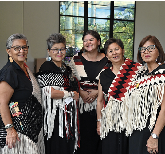  Scenes from the opening of Woven in Wool: Resilience in Coast Salish Weaving at the Burke Museum. The exhibit showcases historical and contemporary woven items, including blankets, tunics, hoods and skirts. 