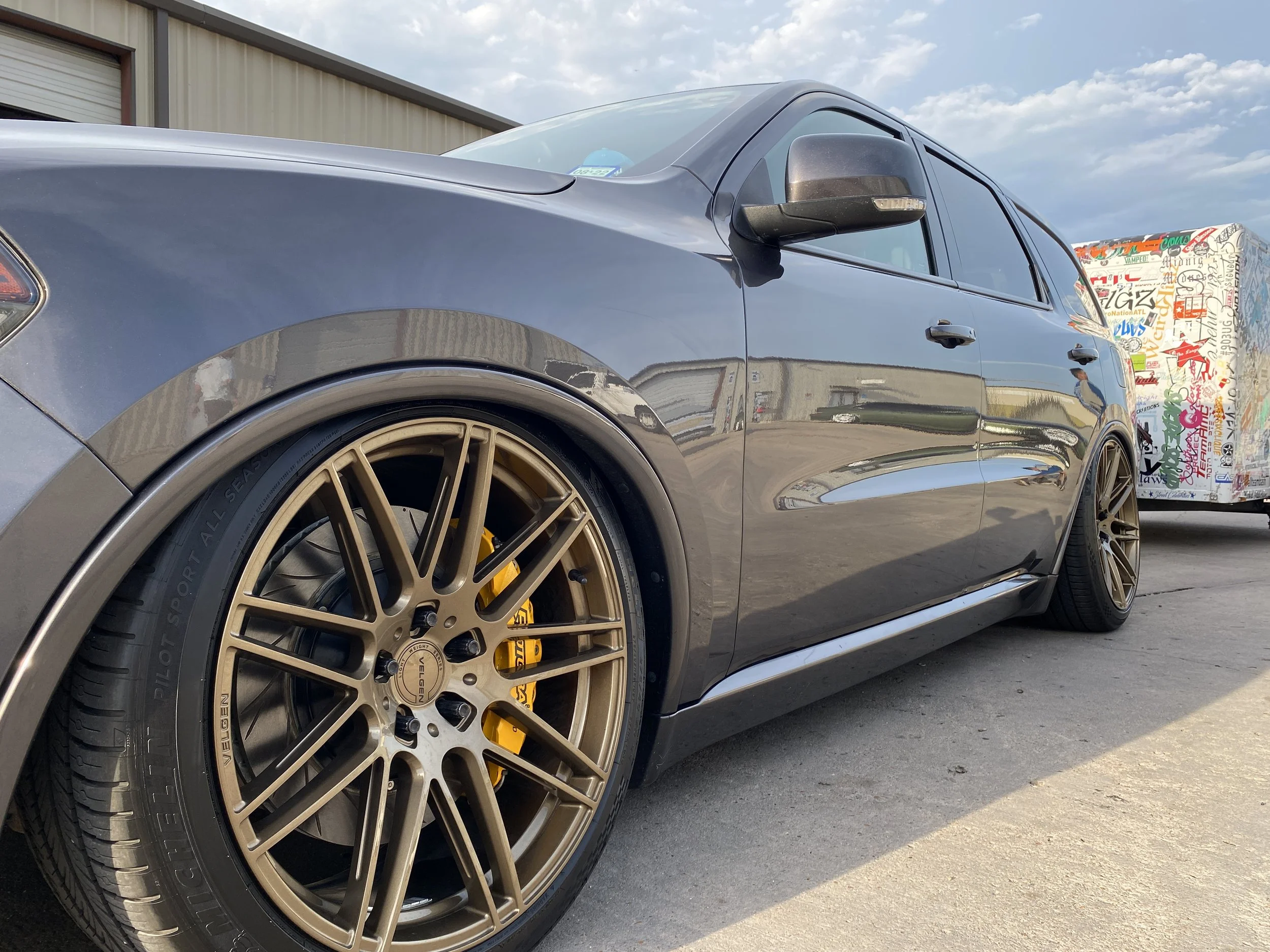 This is what they call, "being on bags." This is Dodge Durango with an airbag suspension, a service we offer.