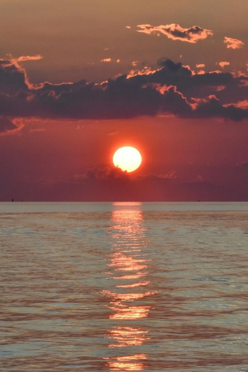 Anxiety therapy in Iowa City: a quiet sunset over a body of water