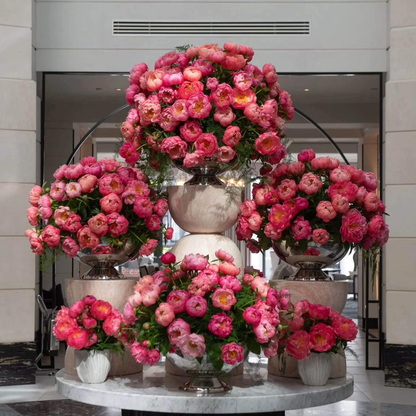 This is presence. Movement. Impact.
Designed to stop guests mid-step the moment they enter the grand Hotel Lobby at @fairmontwp
Peonia Coral Charm is one of the few flowers that transforms dramatically as it opens&mdash;starting bold, almost electric