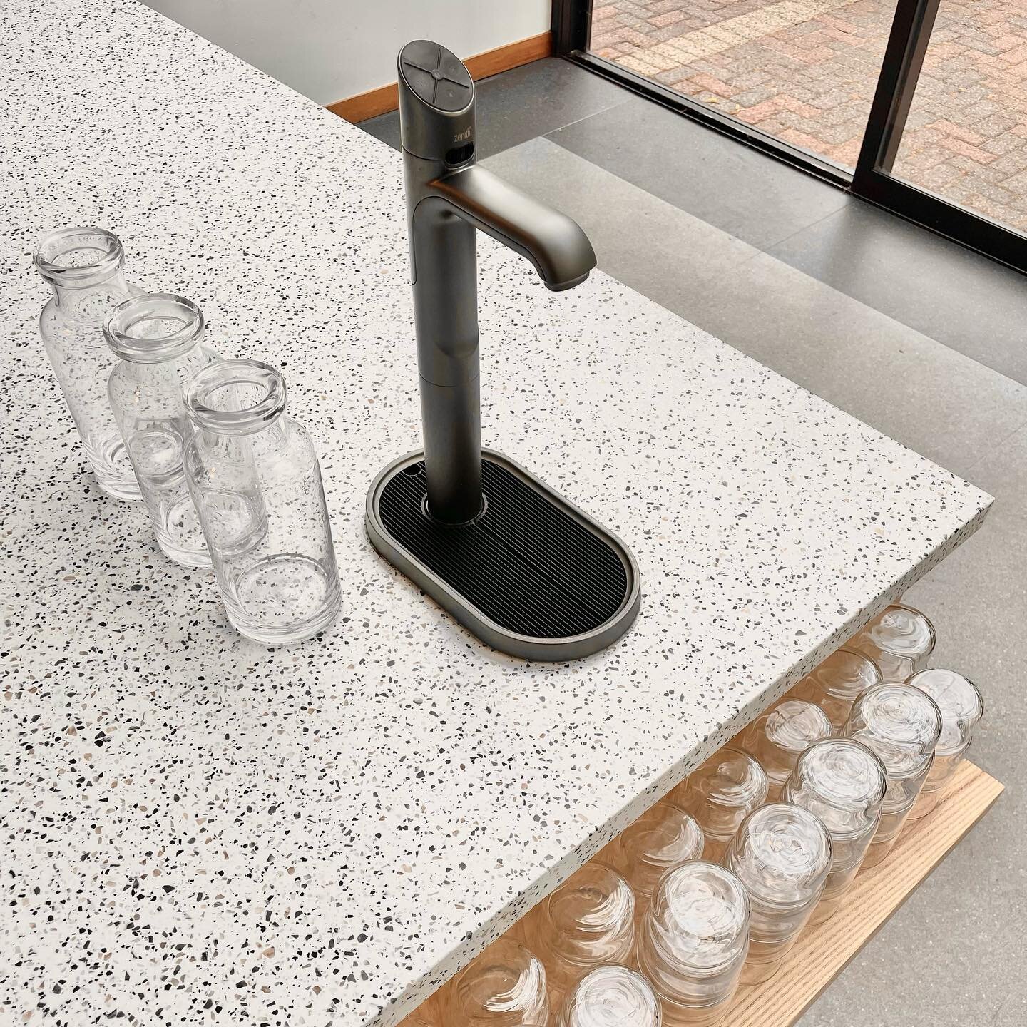 STAY HYDRATED DUNEDIN ⚒️ @precinctfood 🥵
✏️ Solid surface benchtop from @austaronsurfaces 
✏️ American Ash battens &amp; shelf 
✏️ Zenith filtered water 
.
.
.
#cafefitout #frontofhouse #stillorsparkling #cafestyle #otagomuseum