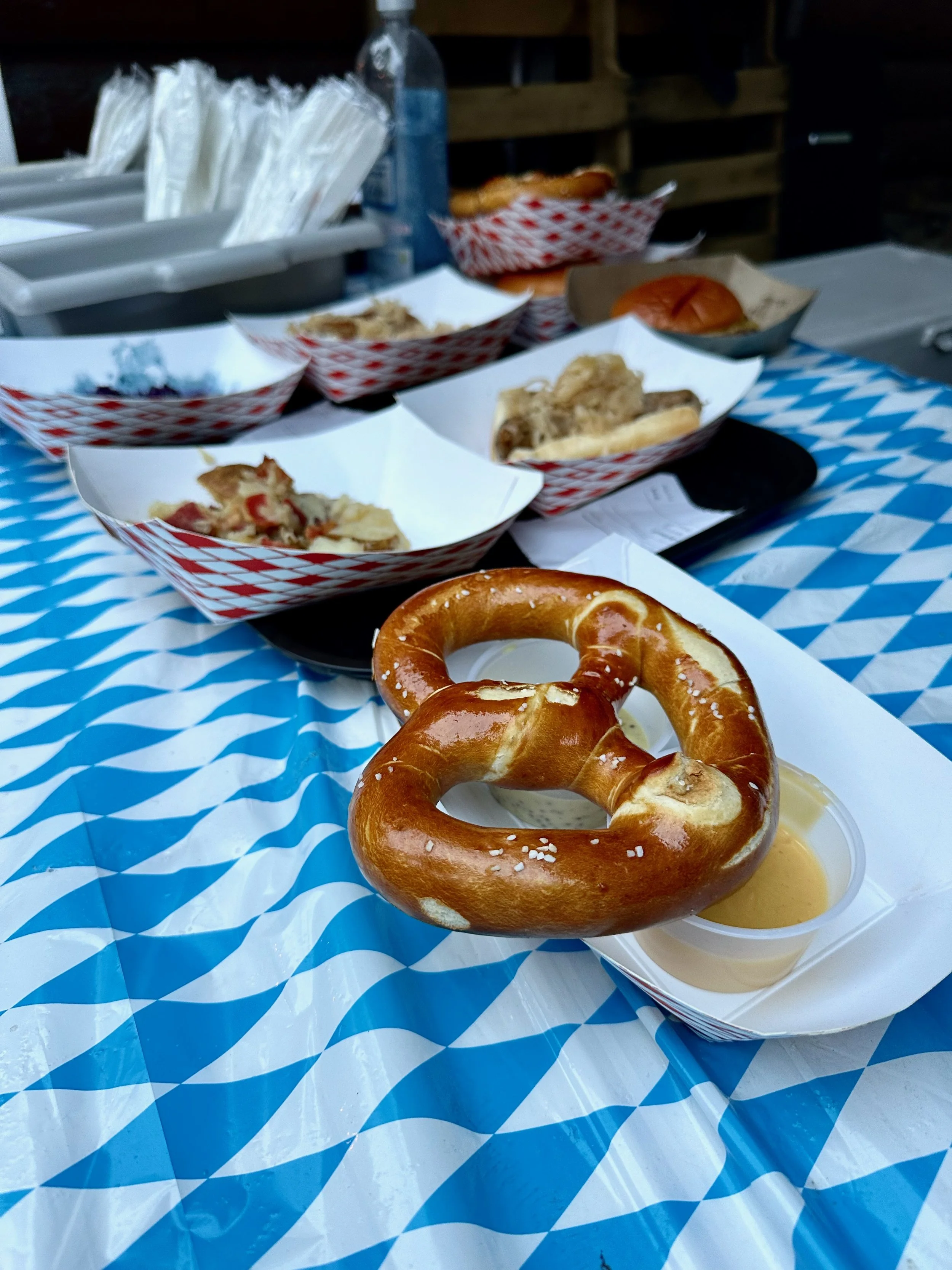 pretzels and german food in paper containers