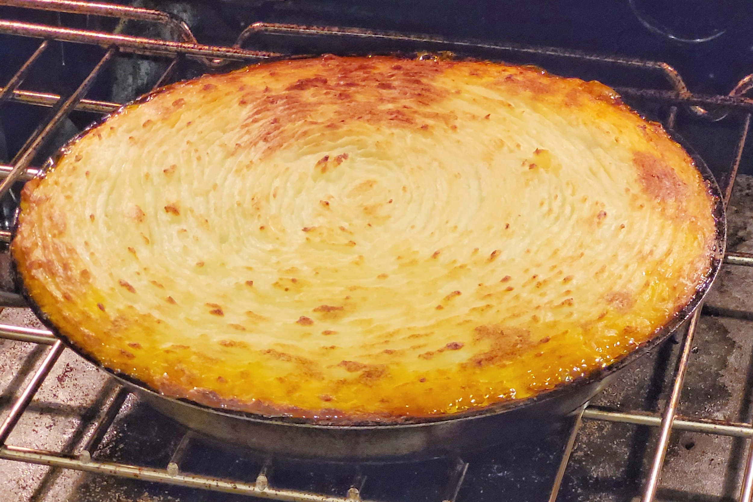 Place in the oven for 30 minutes until lightly browned on top. The shepherd's pie will bubble so place a baking tray or larger frying pan on the shelf below to catch drips.