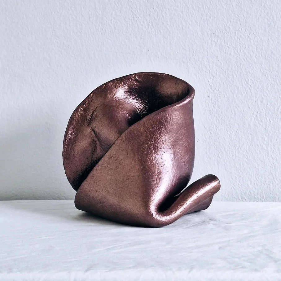 weird clay sculpture