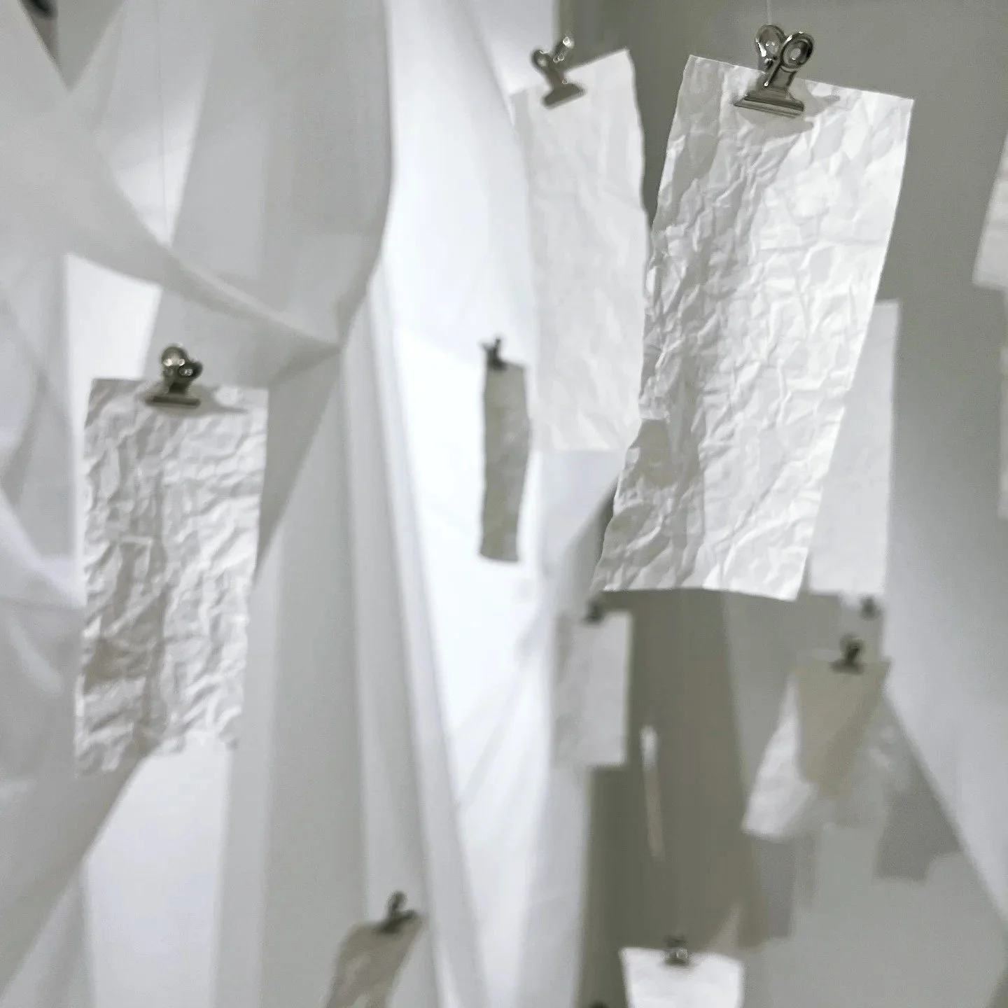 floating white papers, scented