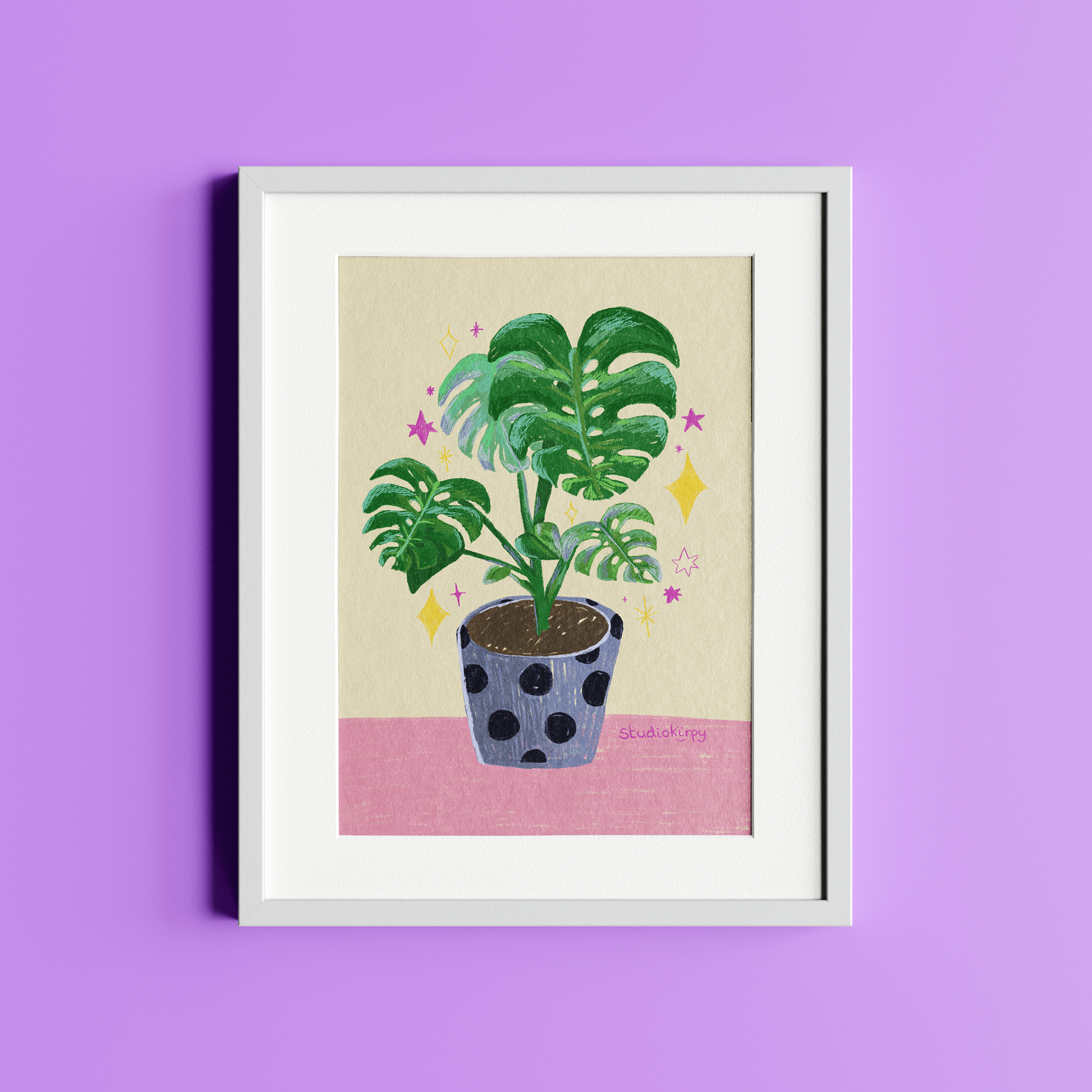 A framed illustration of a potted Monstera plant with green leaves, surrounded by yellow and pink decorative stars and shapes, on a pink background.