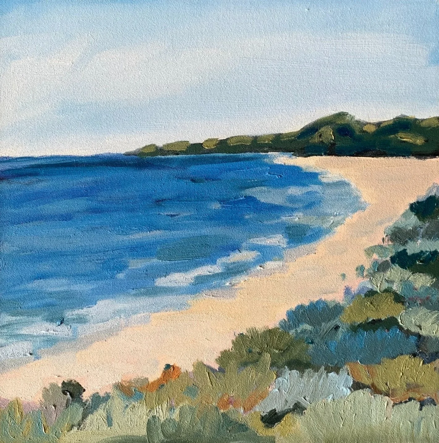 A painting of a coastal landscape with blue ocean waves, a sandy beach, and green bushes and trees along the shoreline under a light sky.