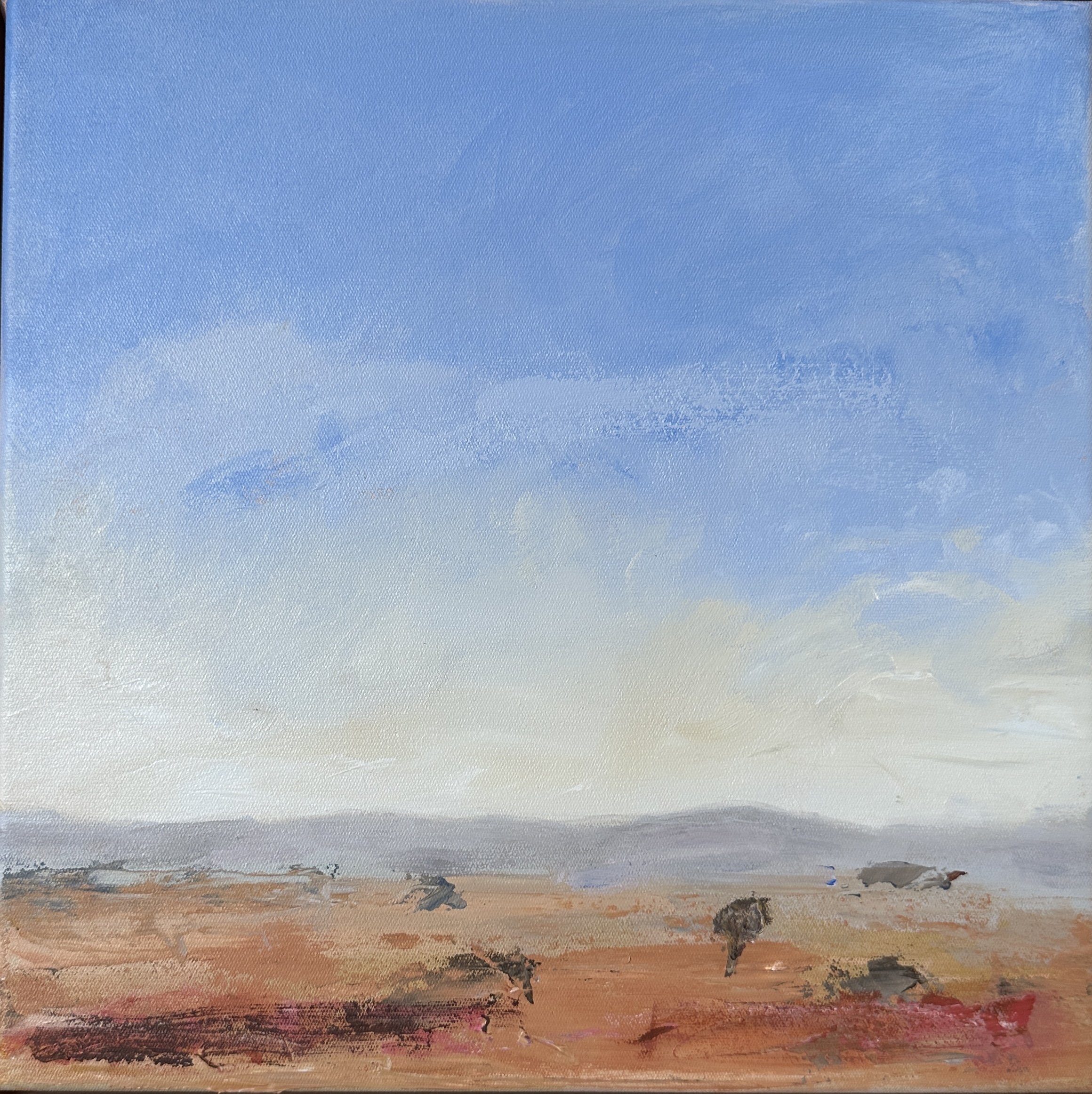 A landscape painting of a field with a few trees, distant mountains in the background, and a cloudy sky.