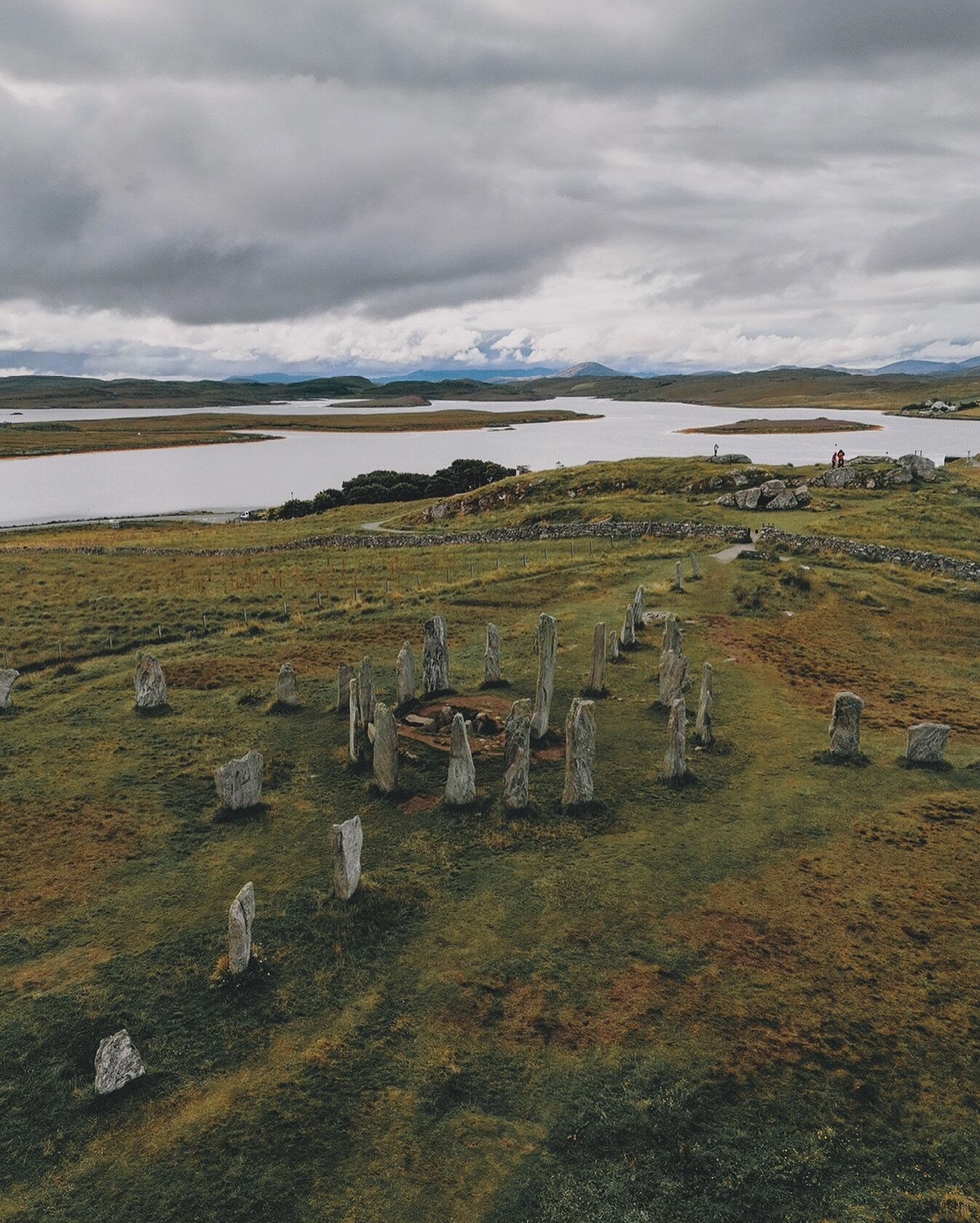 C A L A N A I S

The Calanais Standing Stones, also known as the Callanish Stones or Tursachan Chalanais in Scottish Gaelic, are an extraordinary arrangement of megalithic structures located on the Isle of Lewis in the Outer Hebrides of Scotland. The