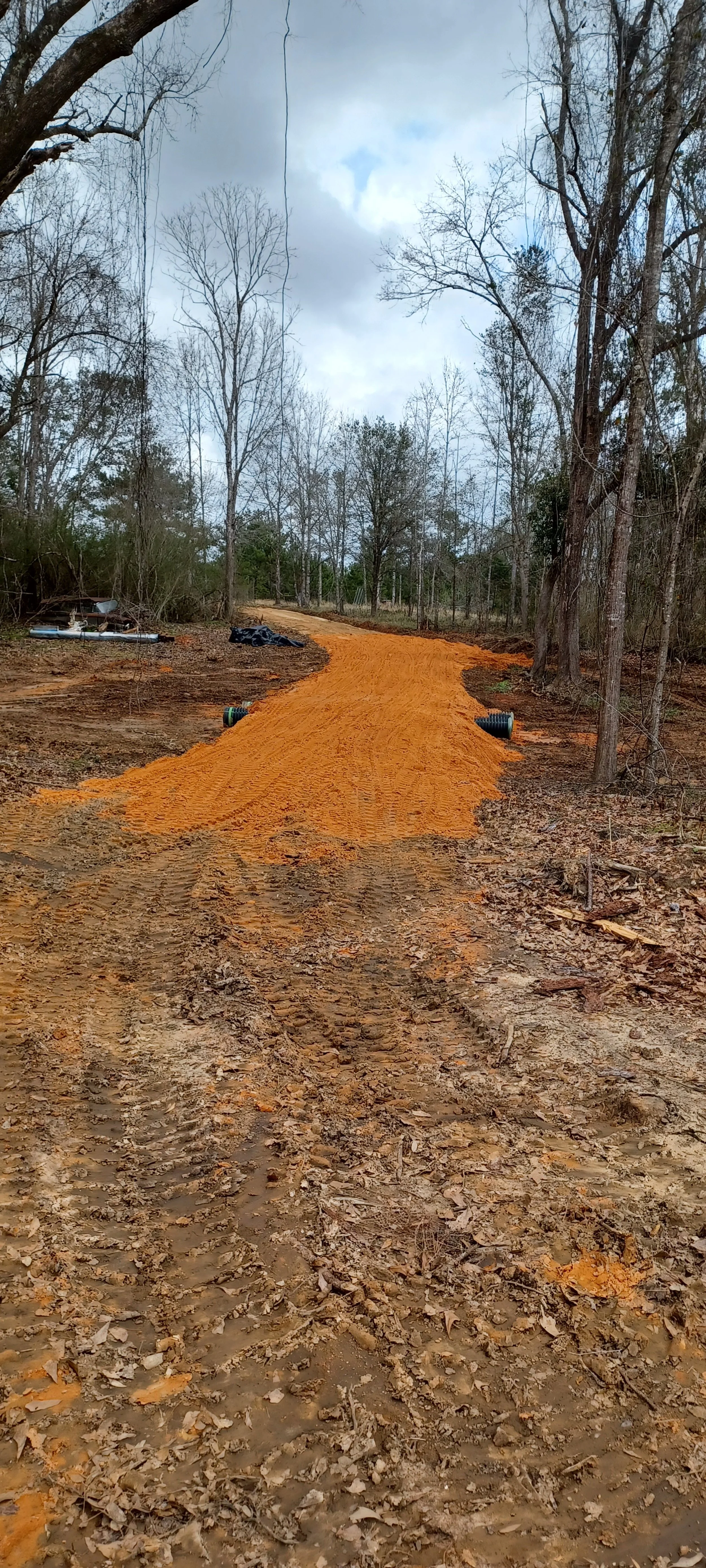 Culvert installation area and drainage work on a build site in Baldwin County, AL — grading and land clearing by RBS Landworks.
