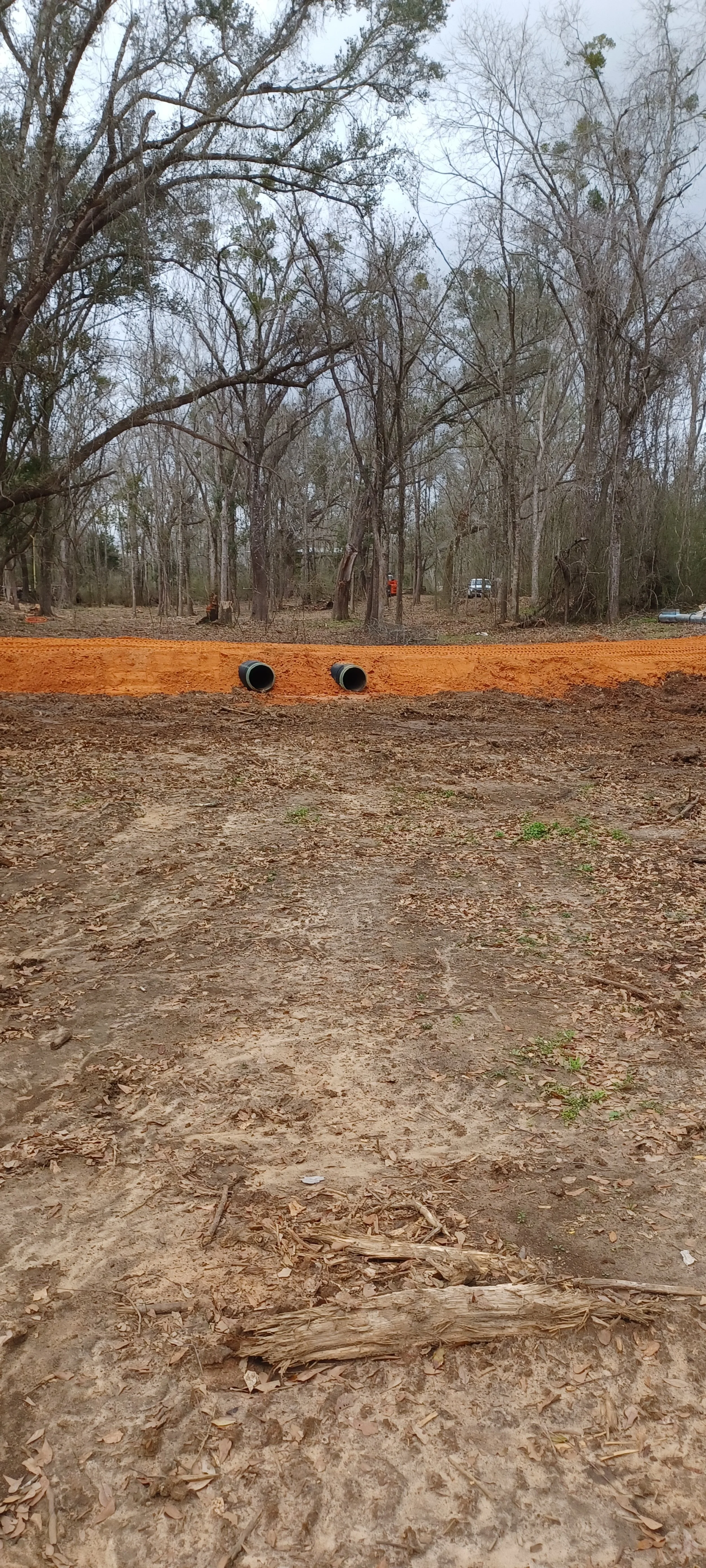Drainage easement clearing and site prep in Baldwin County, AL — land clearing work by RBS Landworks.
