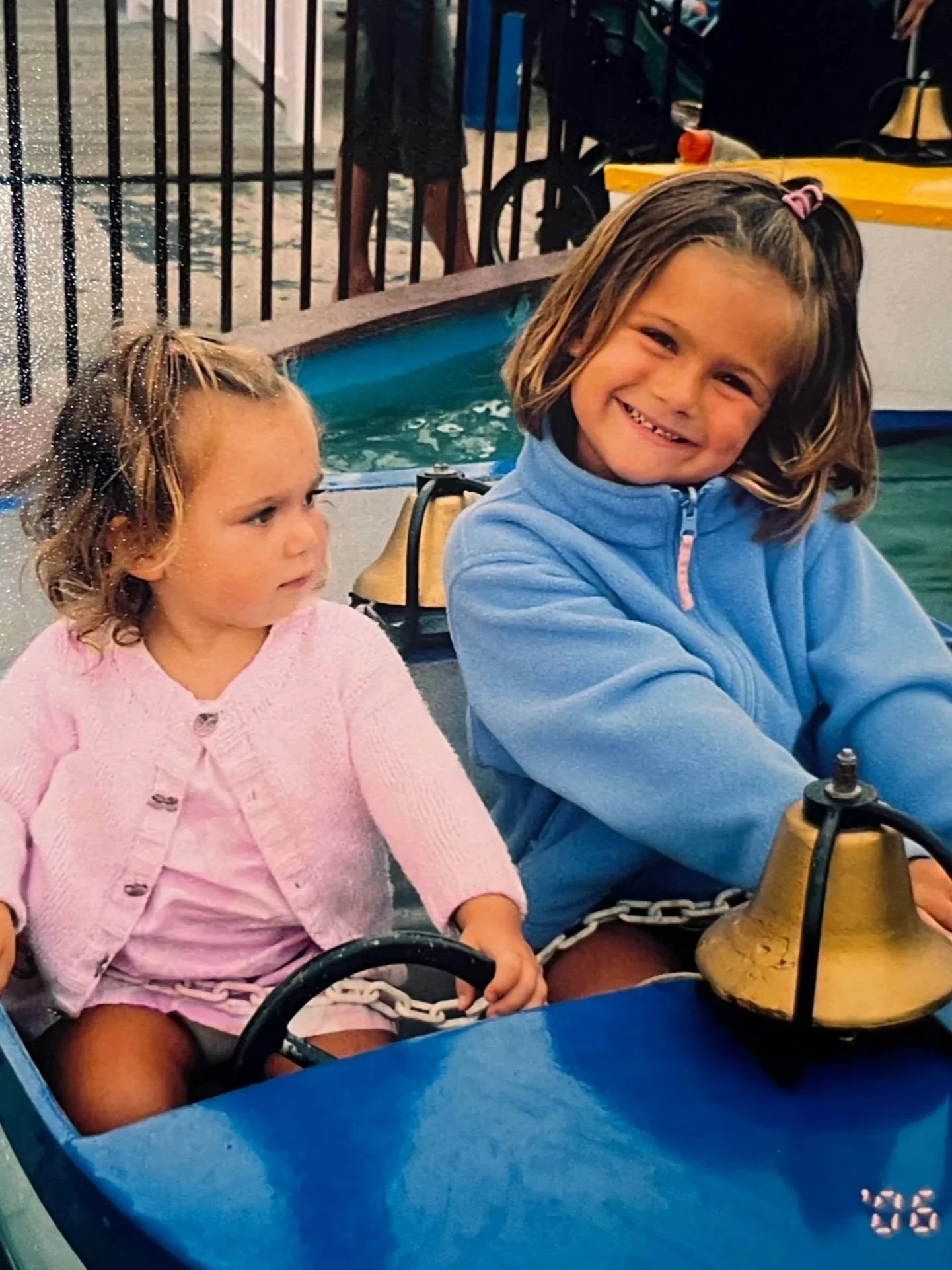 Sisters on an amusement park ride