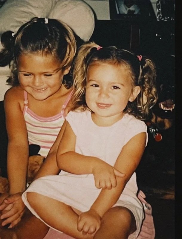 Kaelin and sister dressed in pink