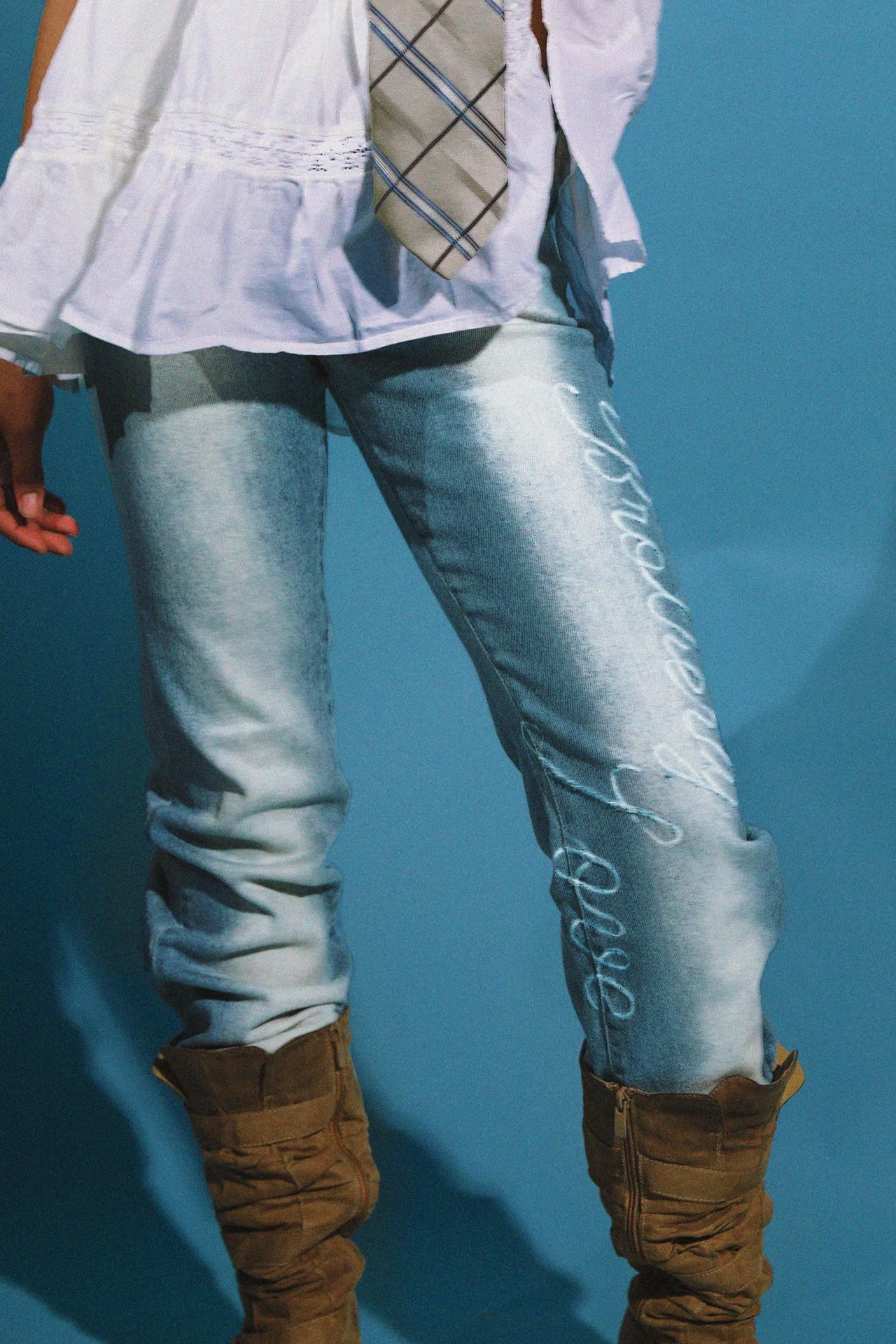 Patches and nail-file-induced rips add super-cute, feminine touches. Some pieces even feature her custom REINA tag!