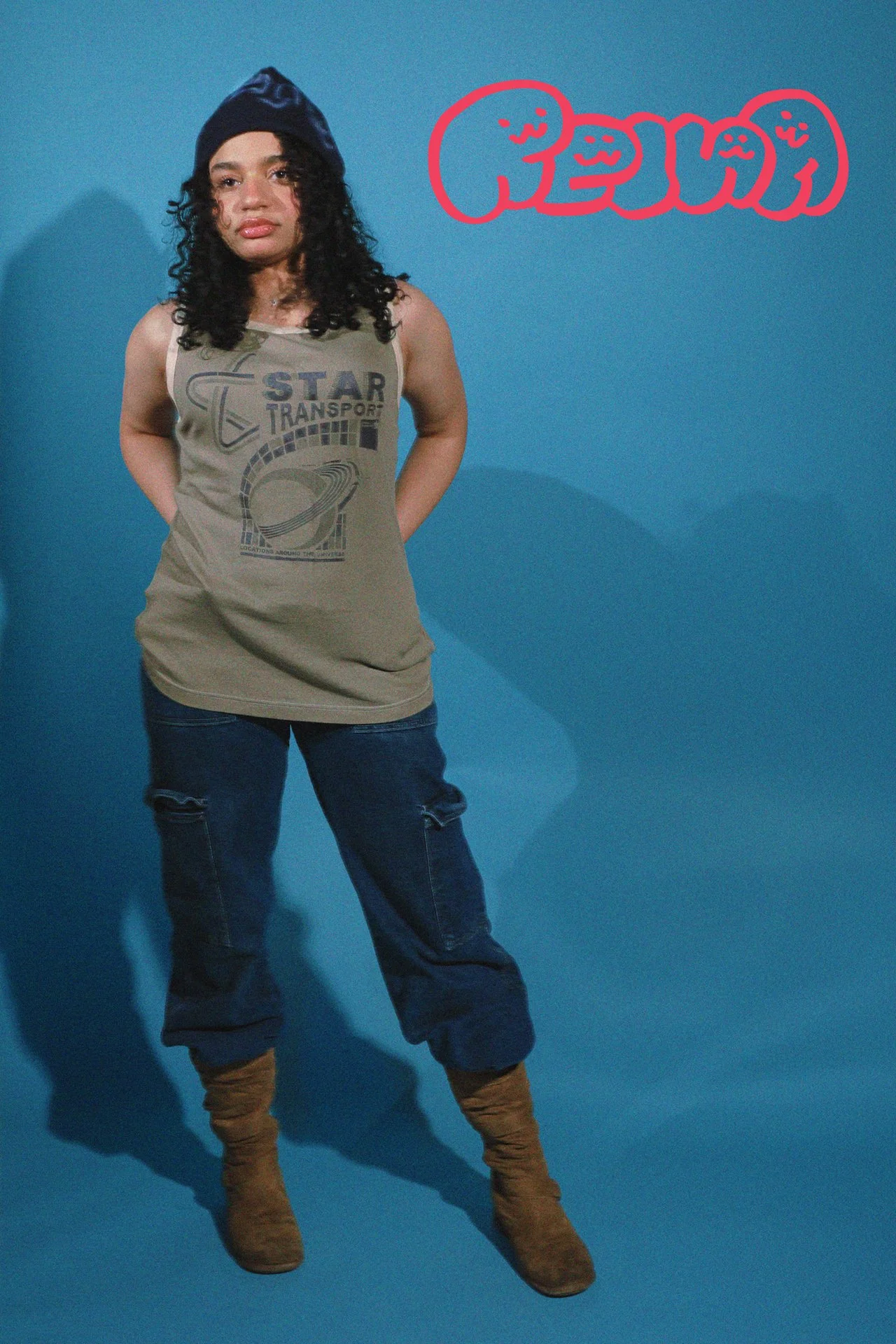 Joanna wears the REINA beanie and Angel Wings Cargo Jeans