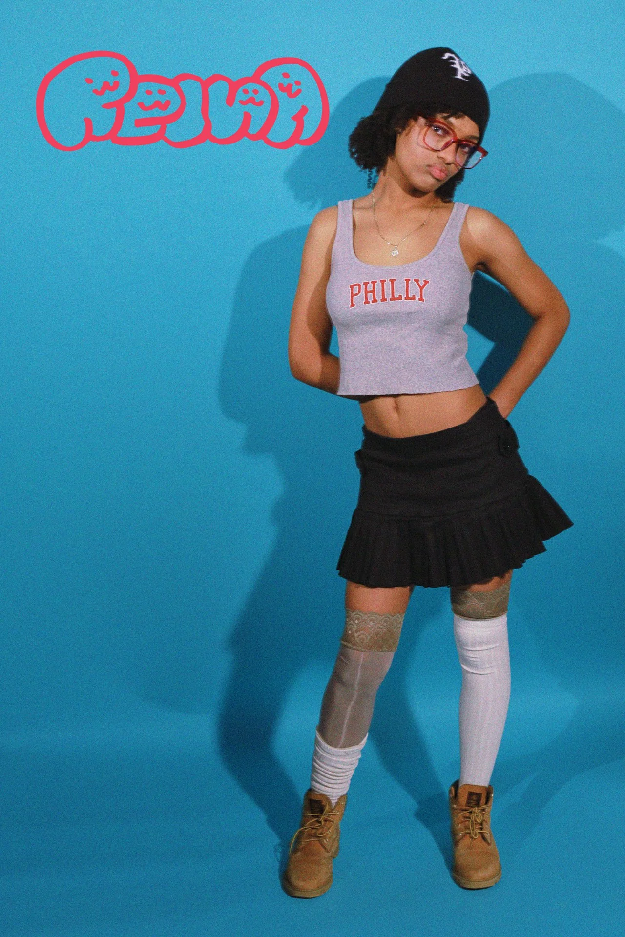 Yagueli wears the Philly Press Beanie