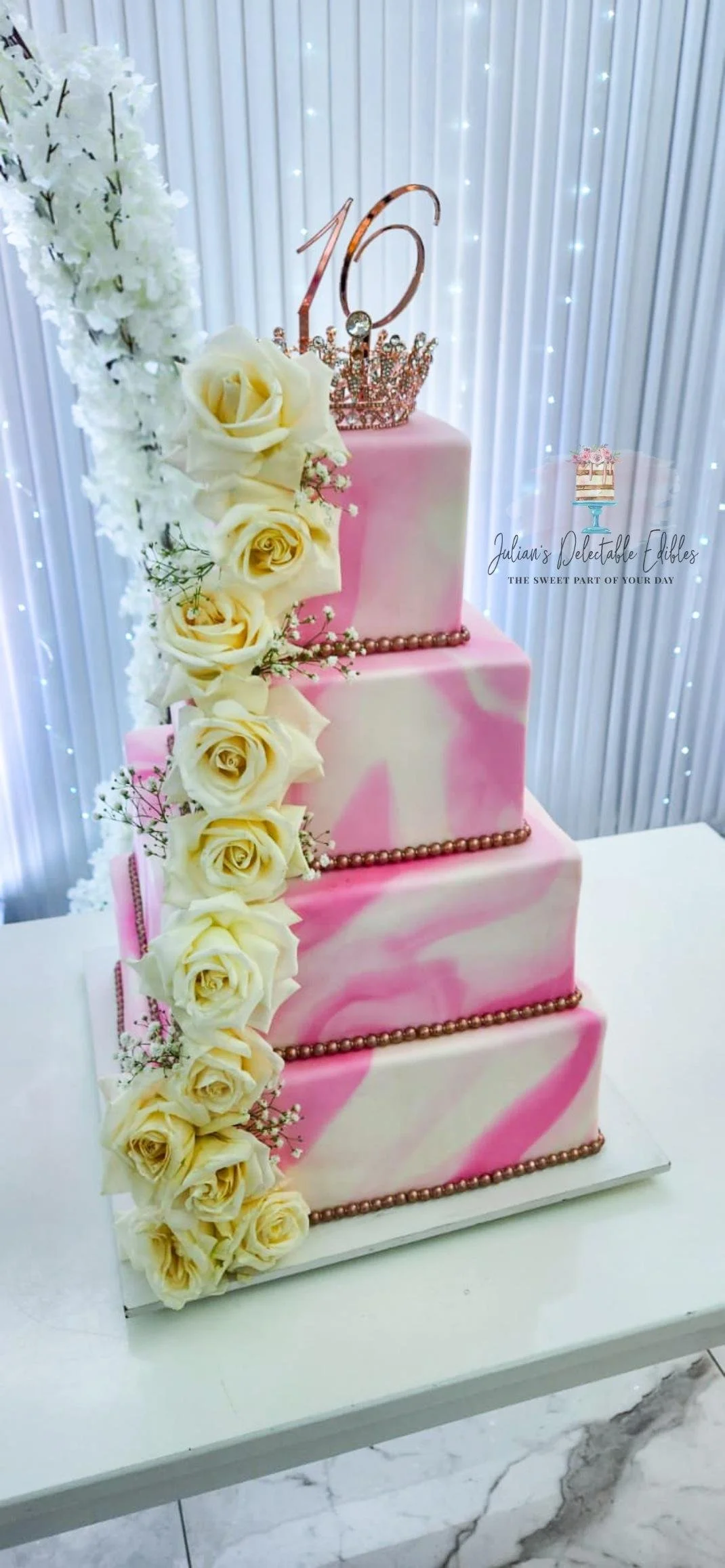 4 tier square cake.jpeg