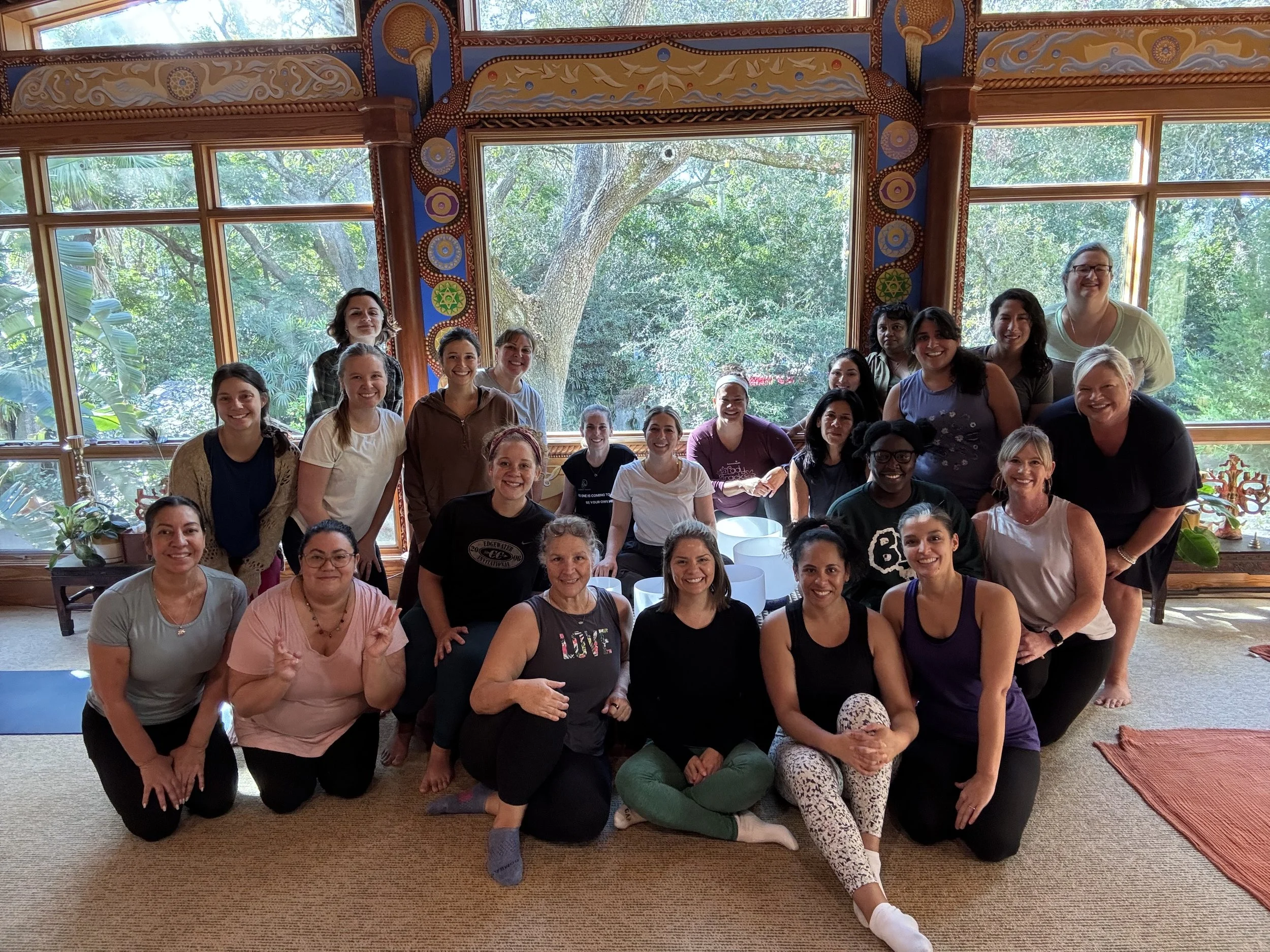 Group of healers sitting around sound healer.