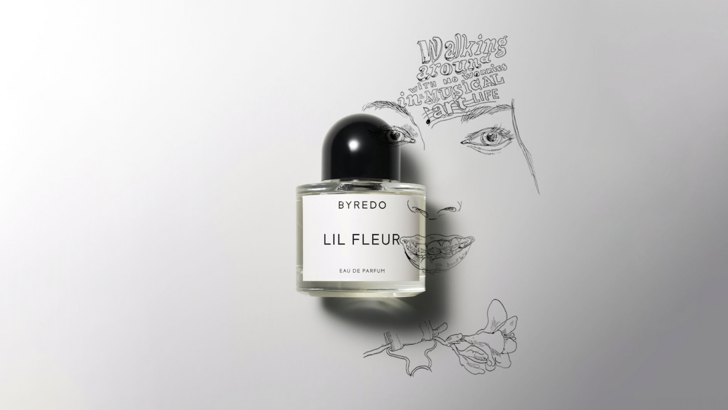 A bottle of BYREDO Lil Fleur perfume placed on paper with a drawing of a woman's face and flowers, with text reading 'Walking around with no worries in musical art life.'