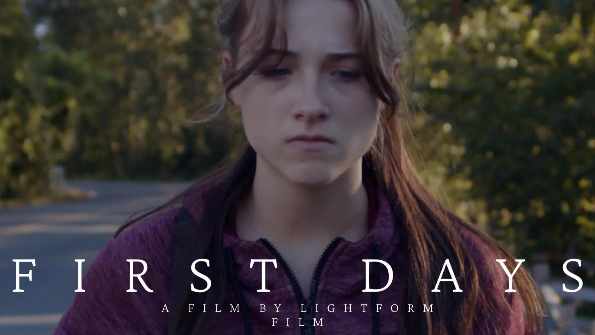 Teenage girl hitchhiking while contemplating her decision